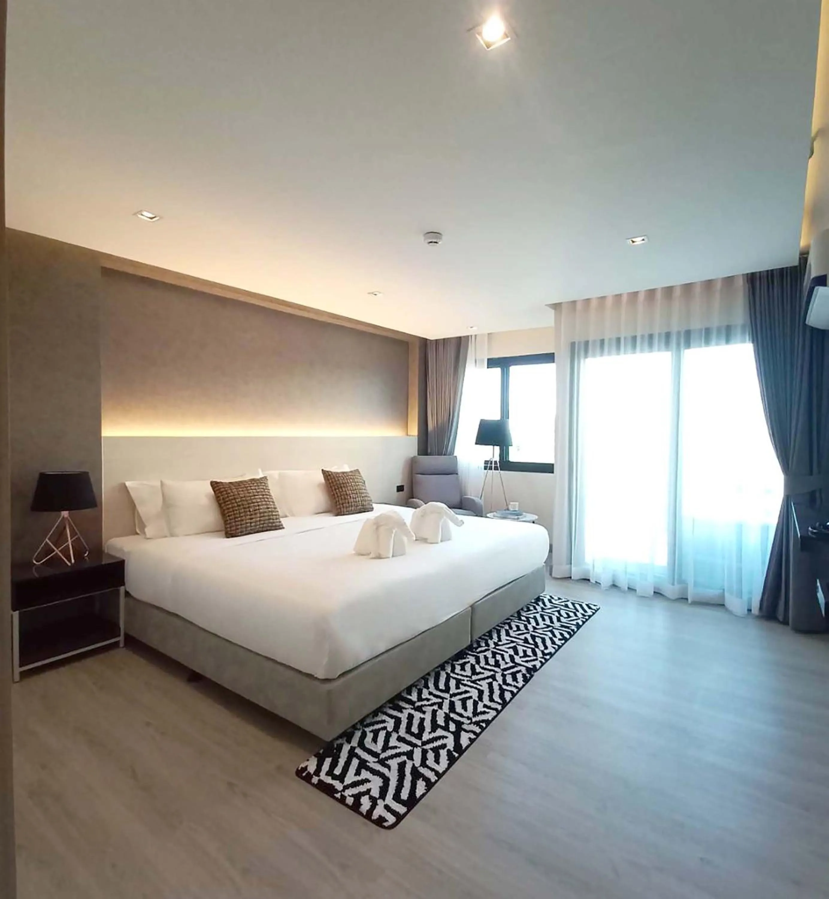 Bed in The 9 Residence Hotel