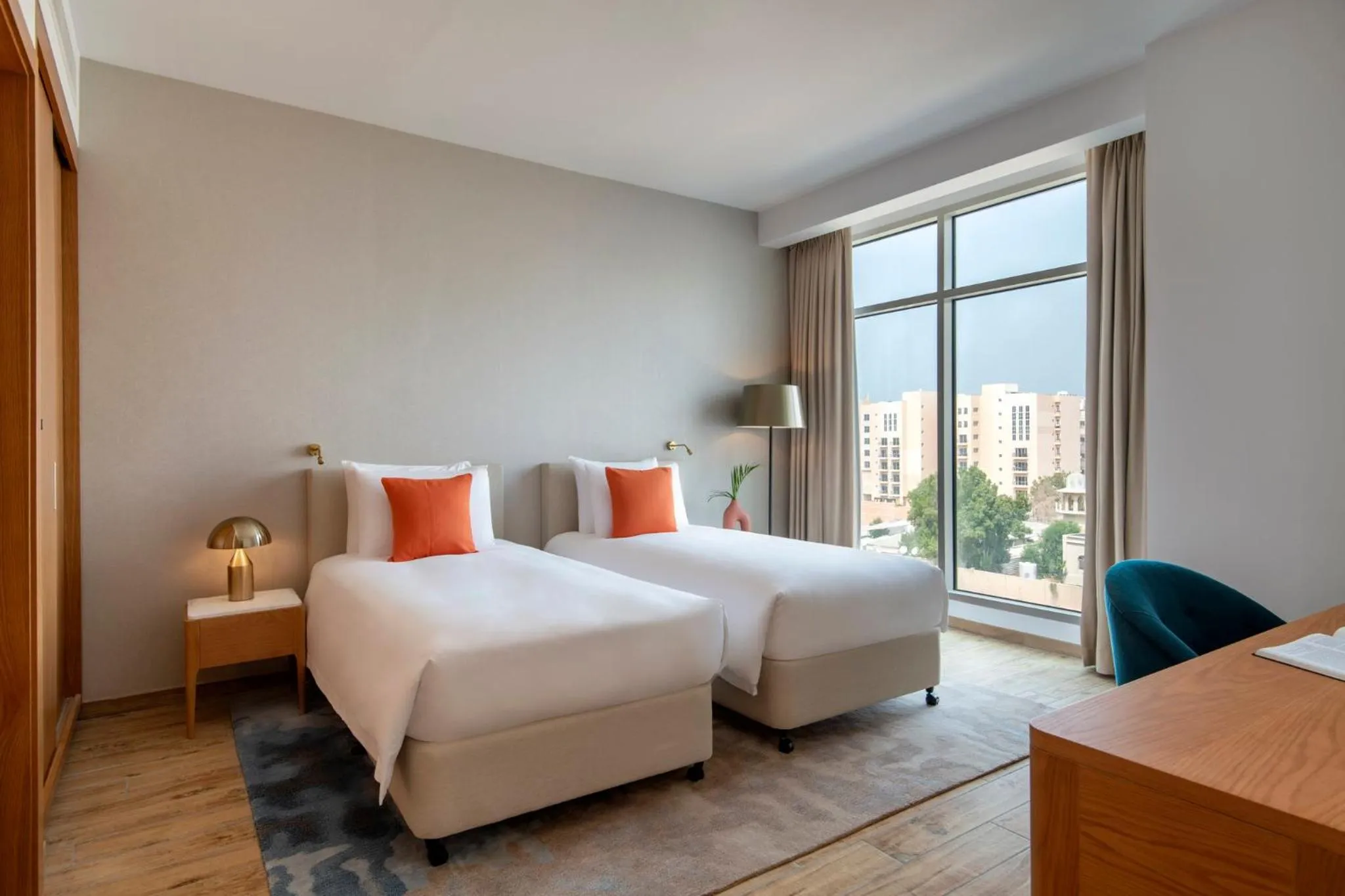 Photo of the whole room, Bed in Abesq Doha Hotel and Residences, an IHG Hotel