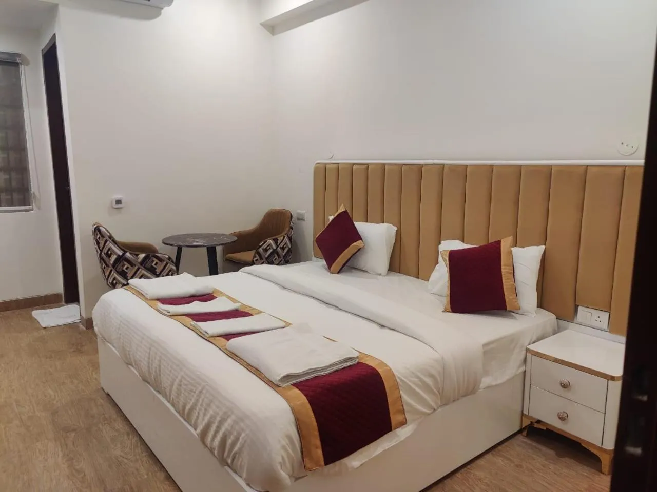 Photo of the whole room, Bed in Amahi Inn I Signature Towers