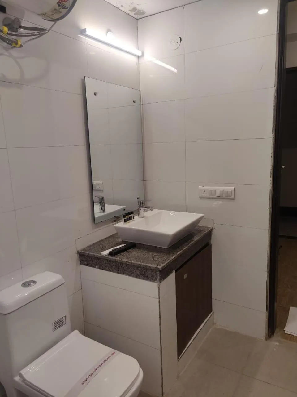 Toilet in Amahi Inn I Signature Towers