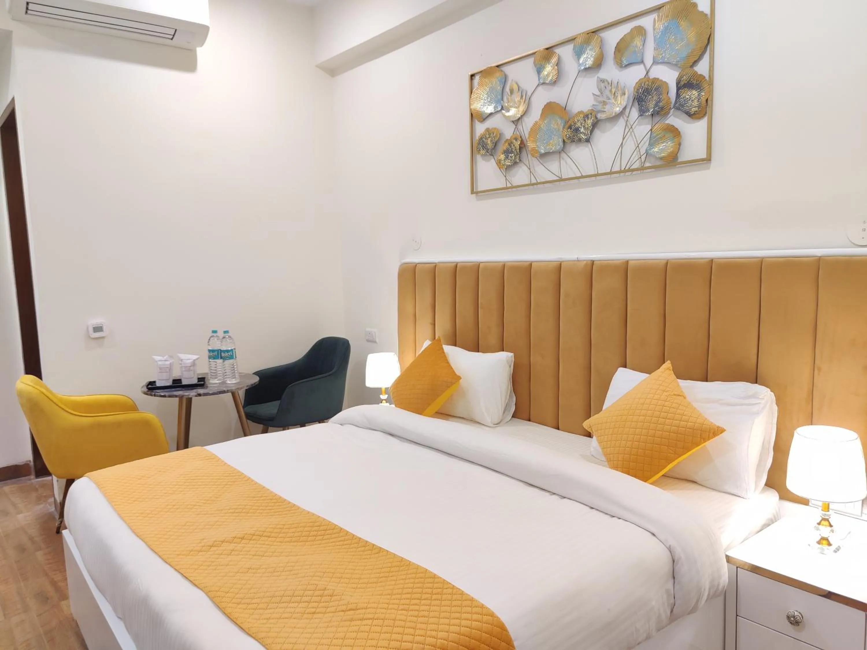 Bed in Amahi Inn I Signature Towers