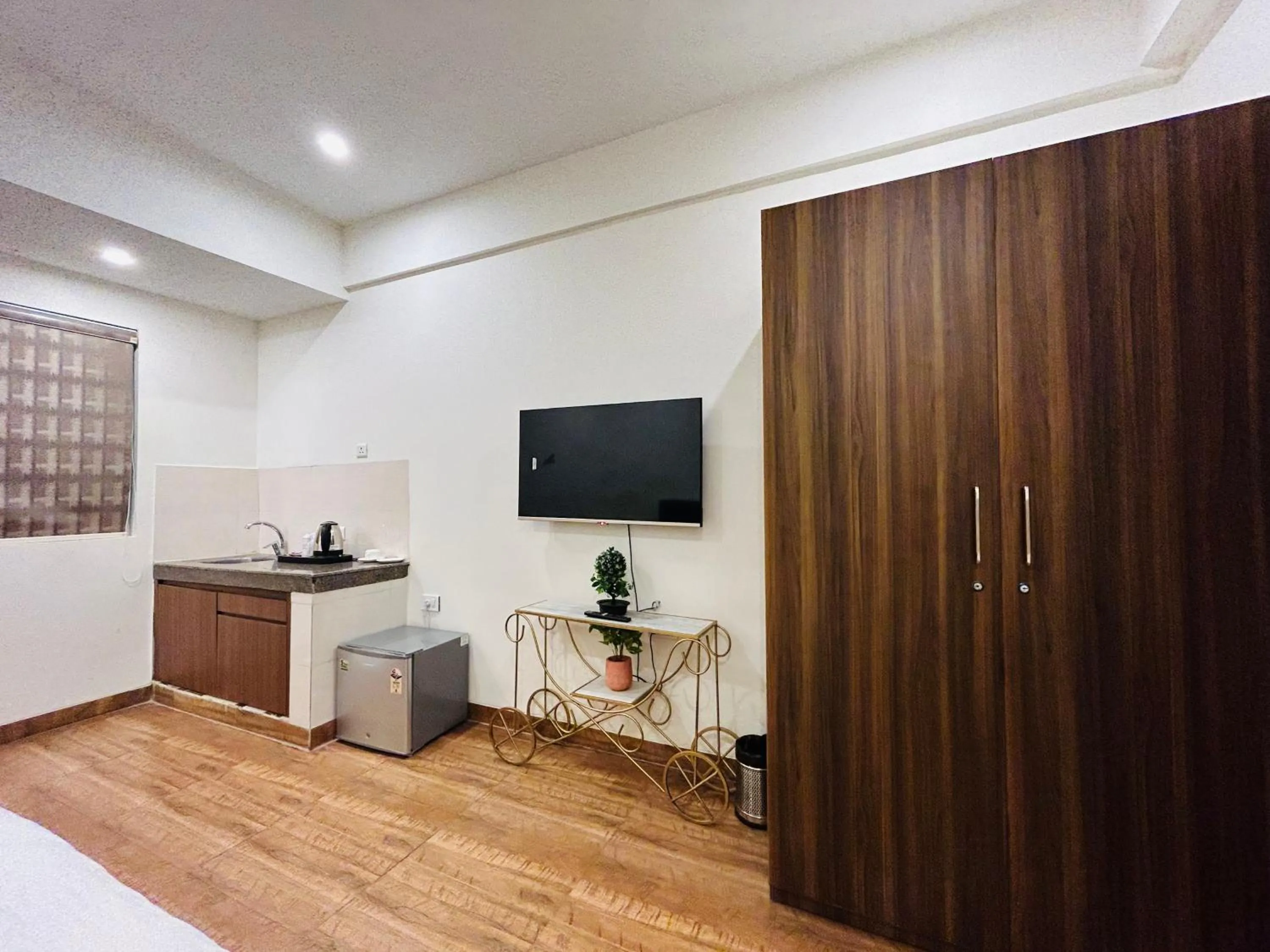 Bed in Amahi Inn I Signature Towers