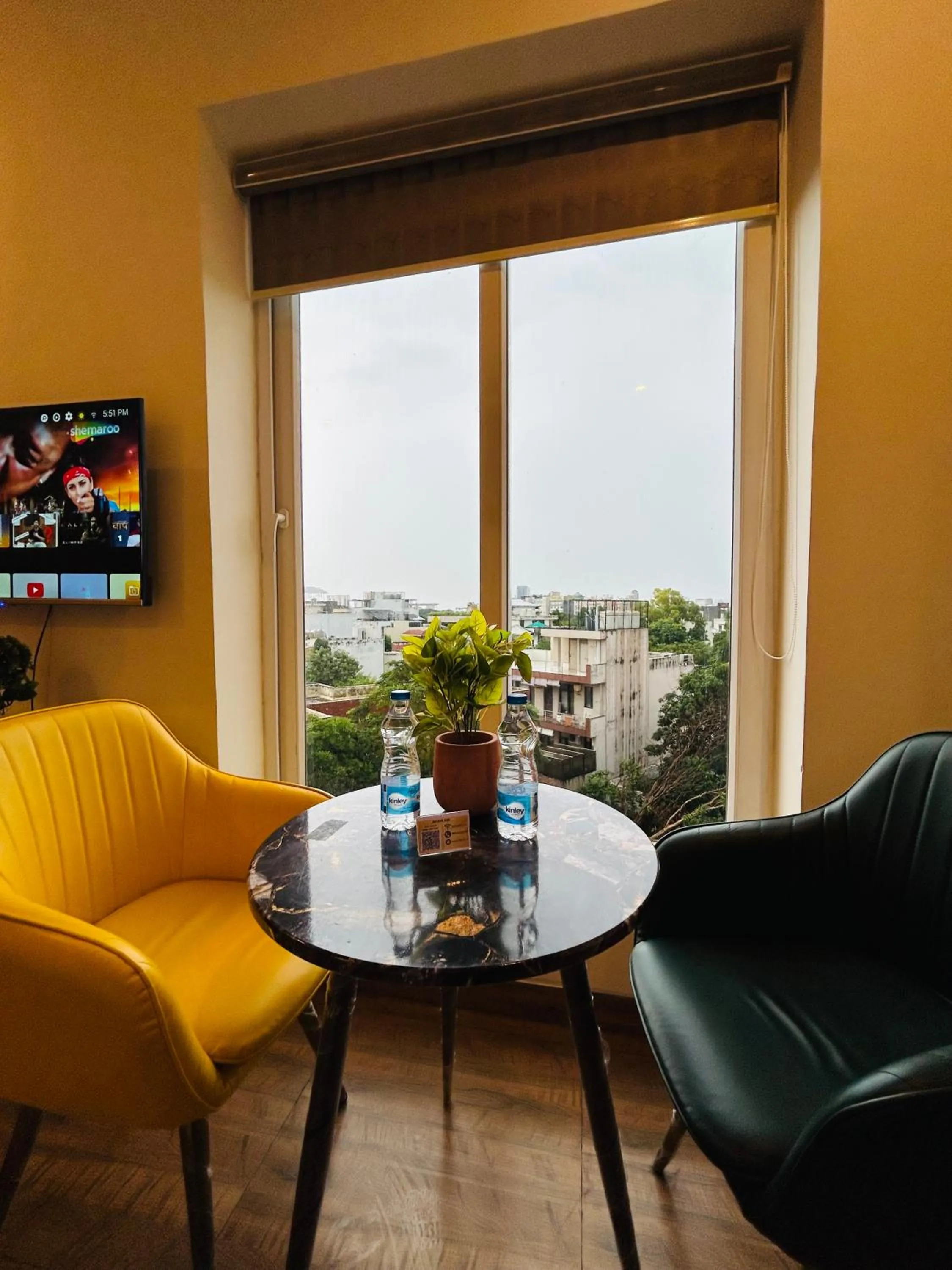 Seating area in Amahi Inn I Signature Towers