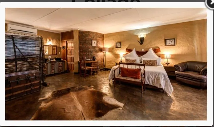 Photo of the whole room, Bed in Ndlovu Lodge