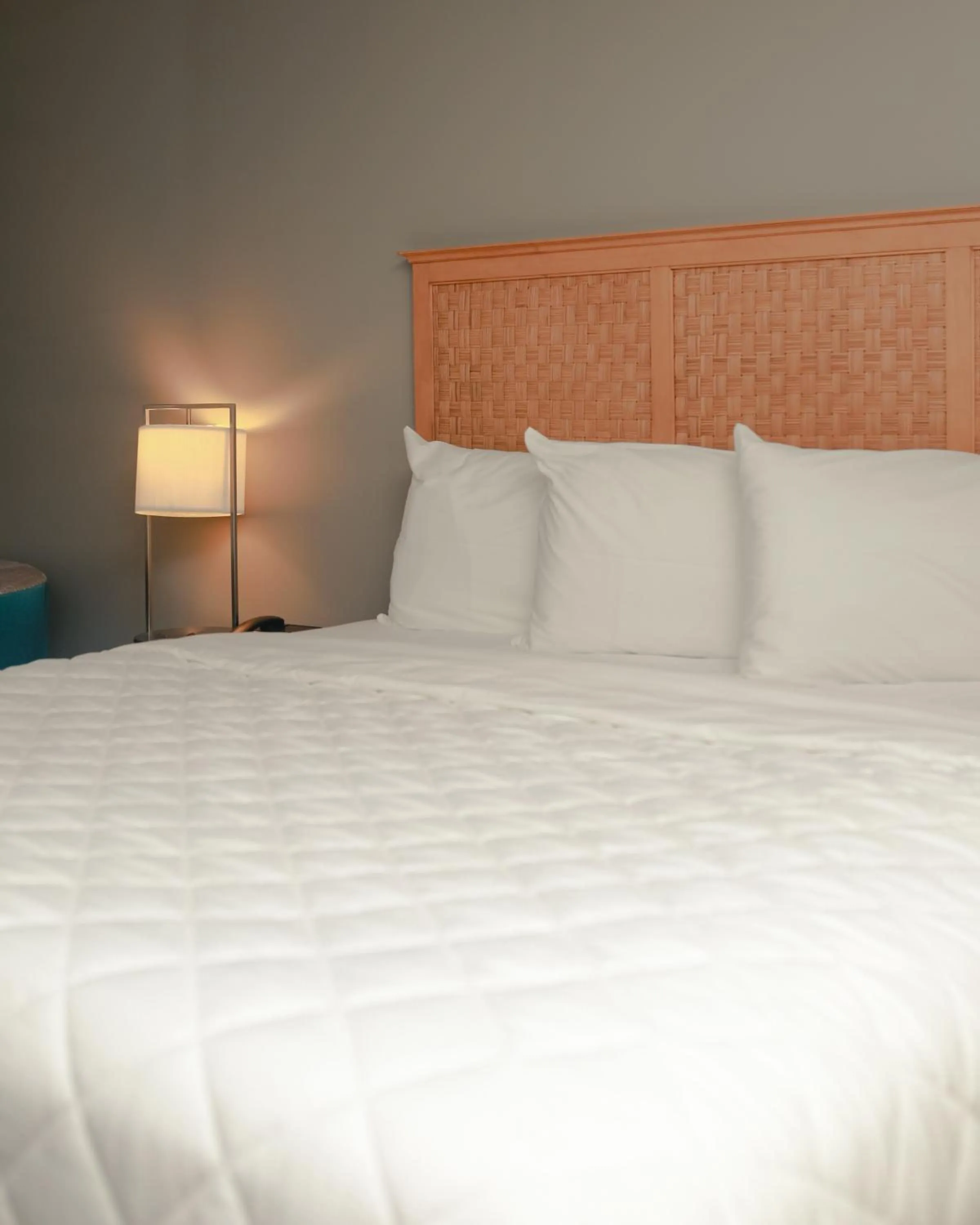 Bed in Southern Breeze Ocean Front Hotel