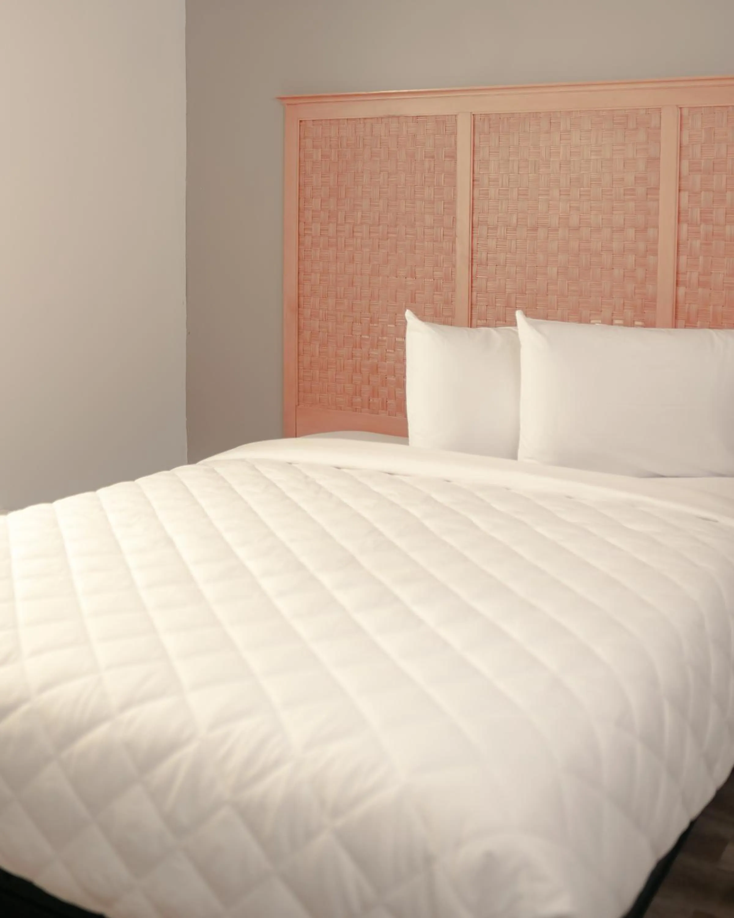 Bed in Southern Breeze Ocean Front Hotel