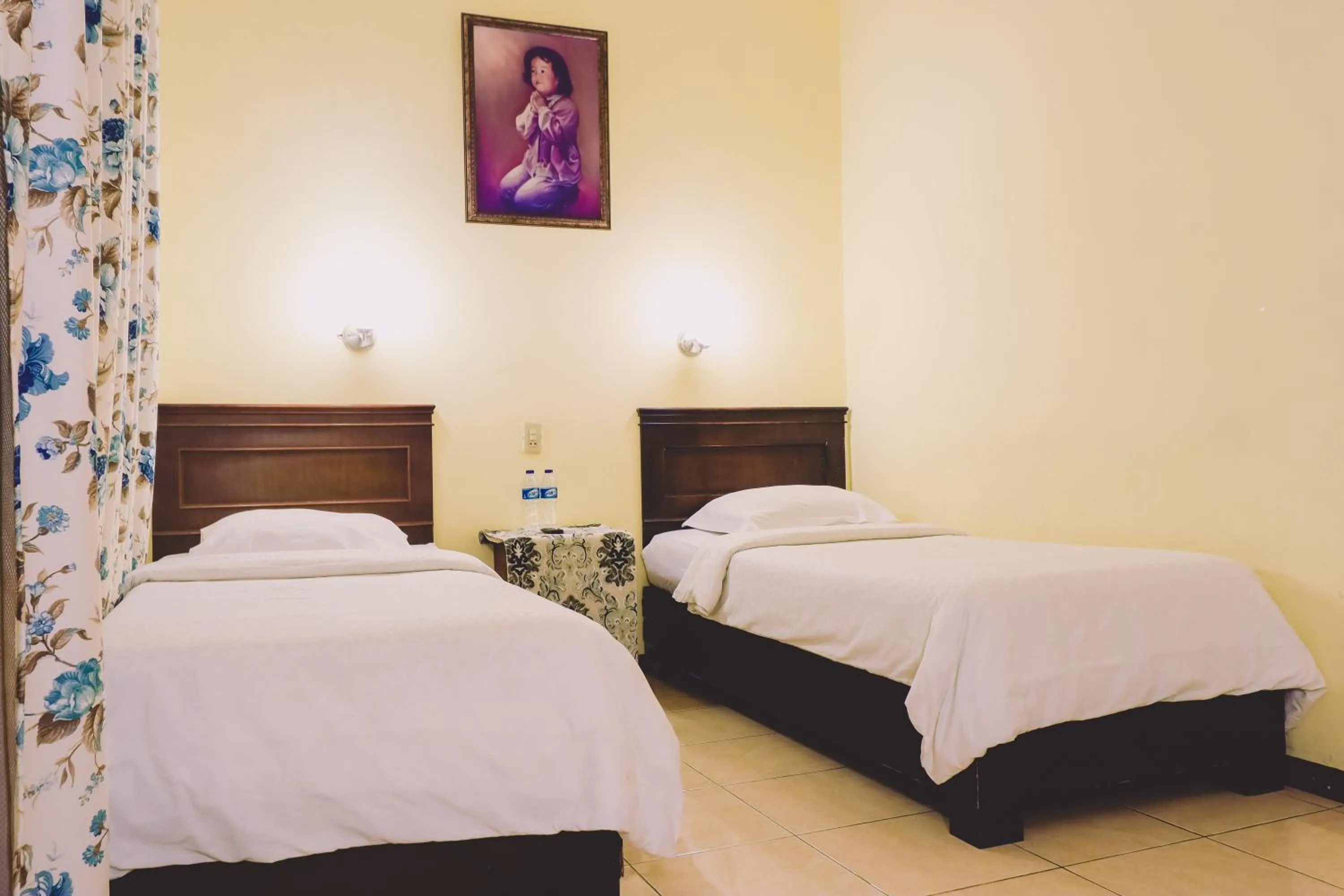 Bed in PIA Hotel Medan