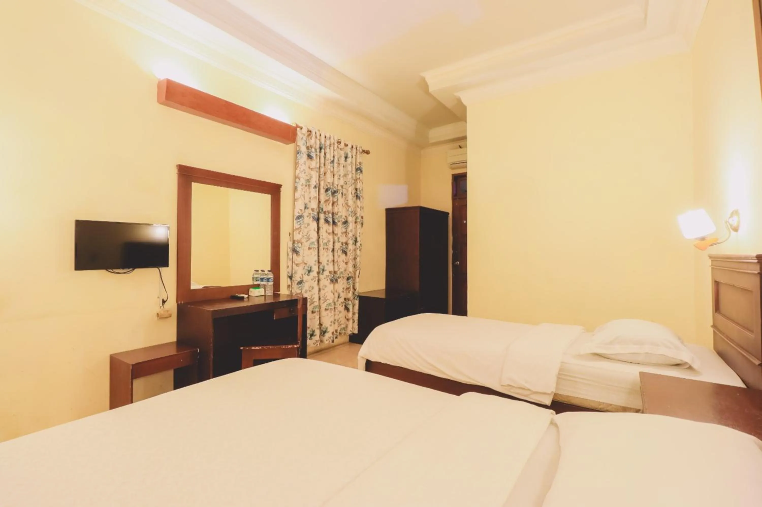 Bed in PIA Hotel Medan