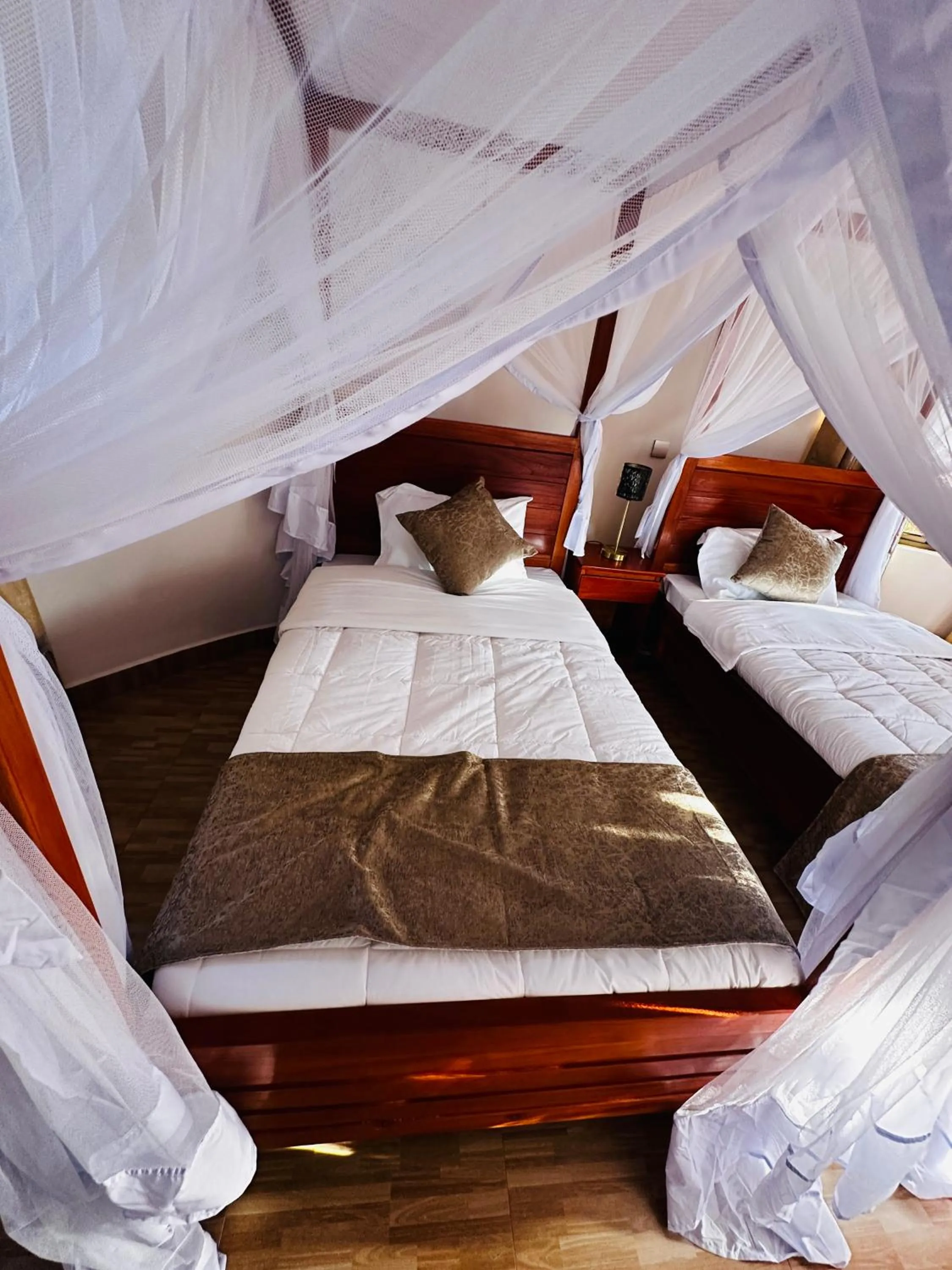 Bedroom, Bed in Wademac Arusha Inn Hotel