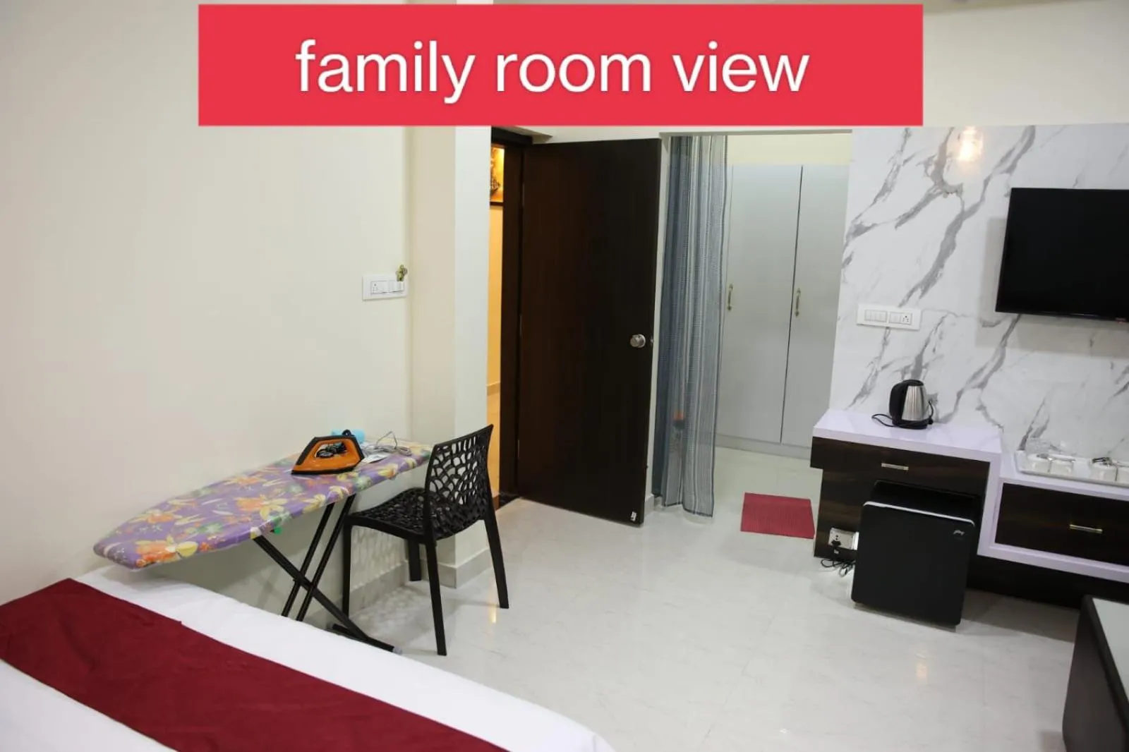 Communal lounge/ TV room, Bed in Sunshine International Boarding & Lodging