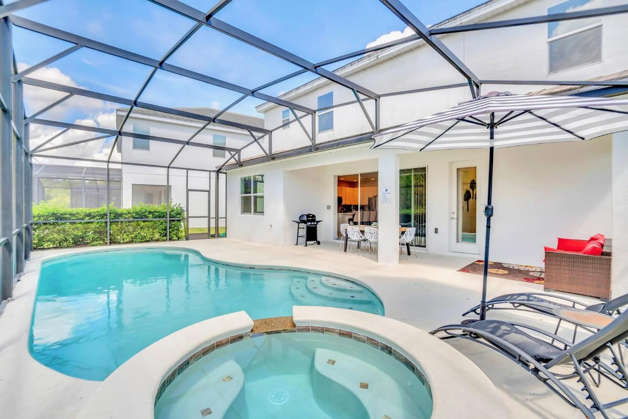 Pool view in 5BR Family Home with Pool & Hot Tub Near Disney