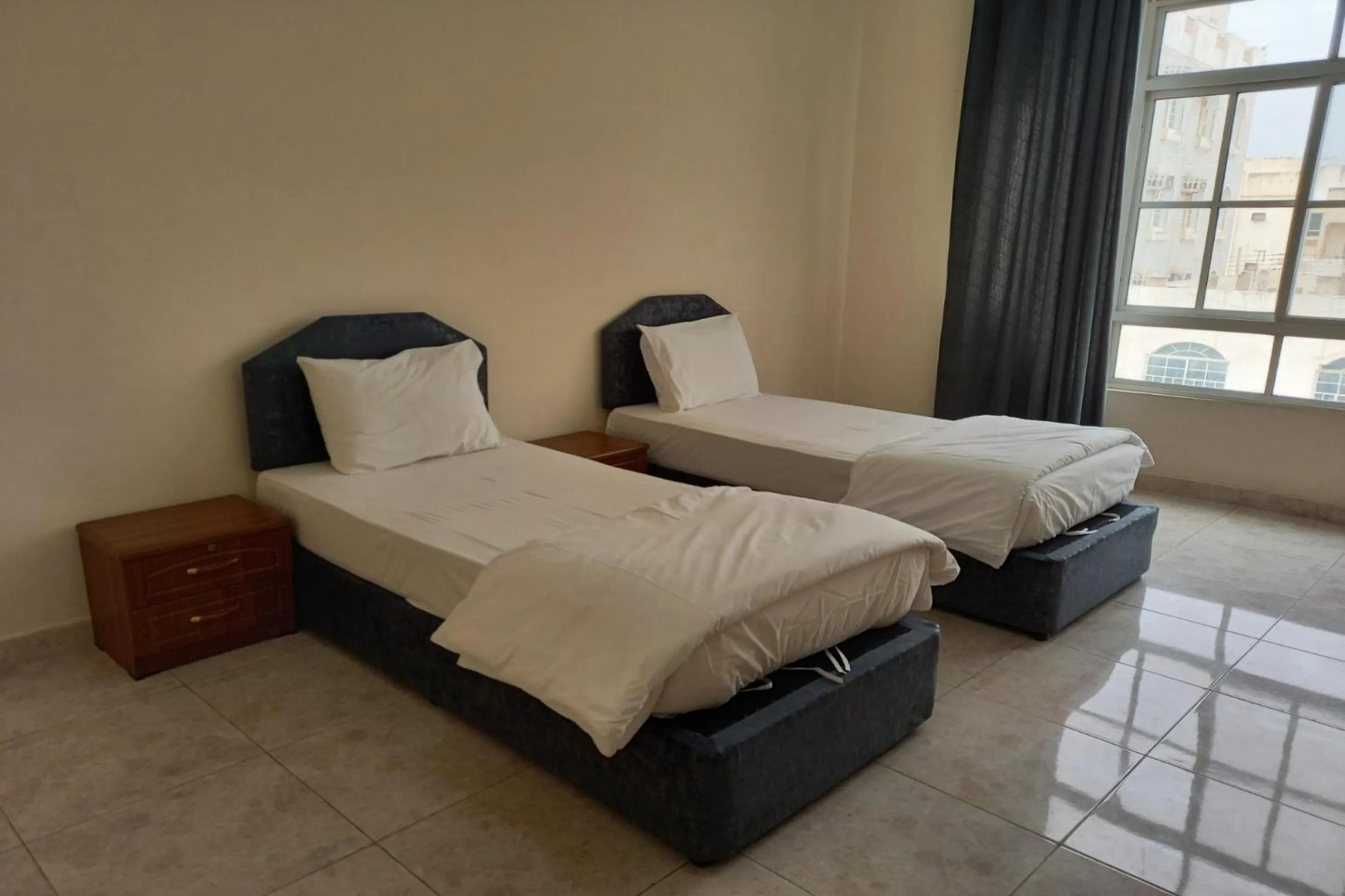 Bedroom, Bed in Super OYO 147 Babylon Furnished Apartment