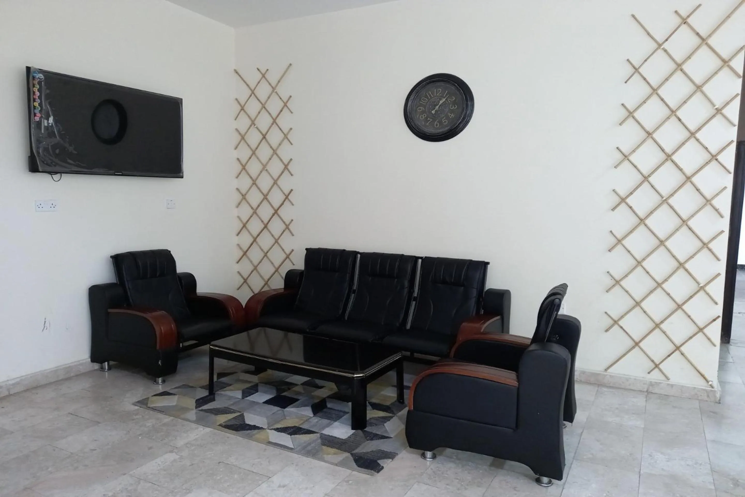 Lobby or reception in Super OYO 147 Babylon Furnished Apartment