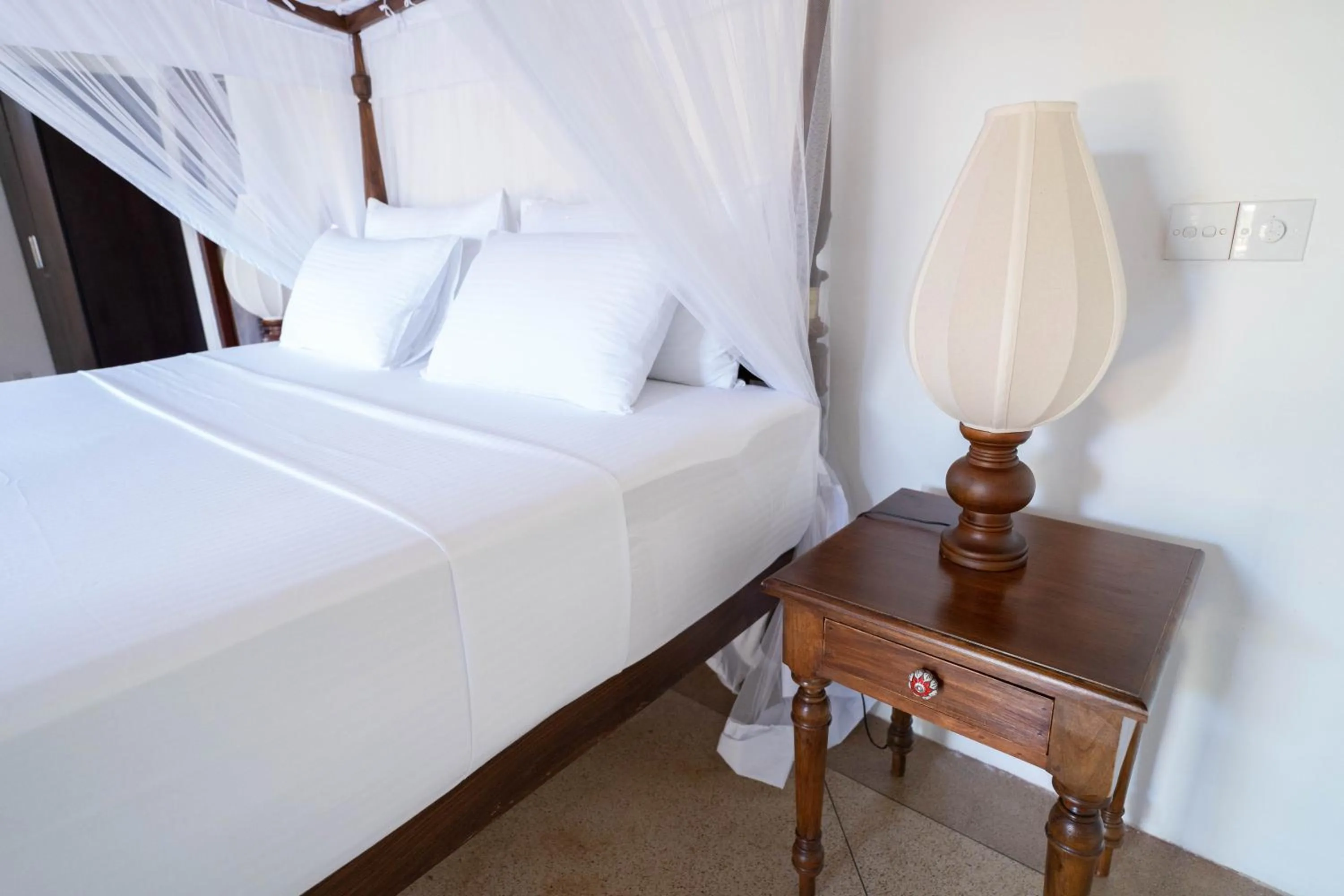 Bed in GALLE HERITAGE VILLA