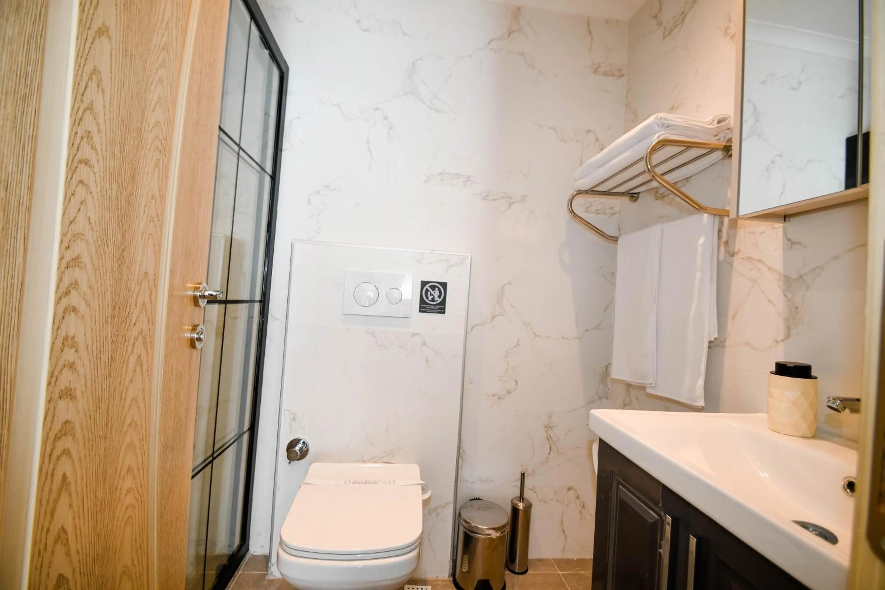 Toilet in Swan Boutique Hotel