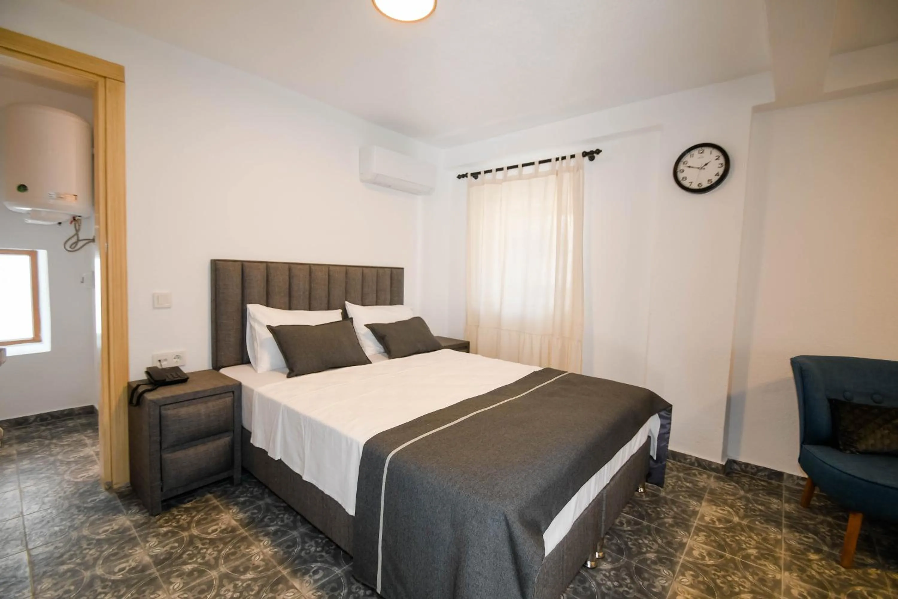 Bed in Swan Boutique Hotel