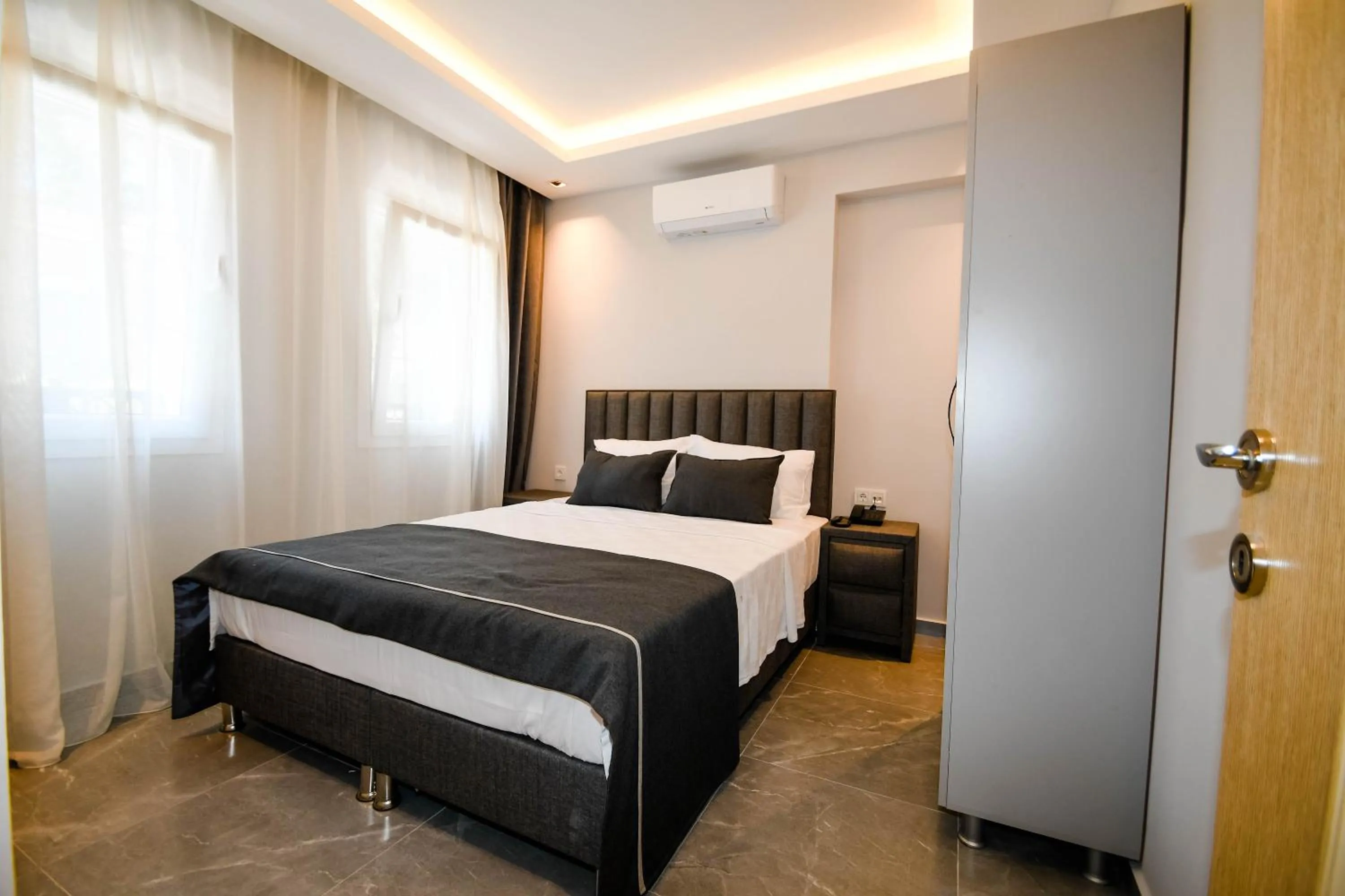 Bed in Swan Boutique Hotel