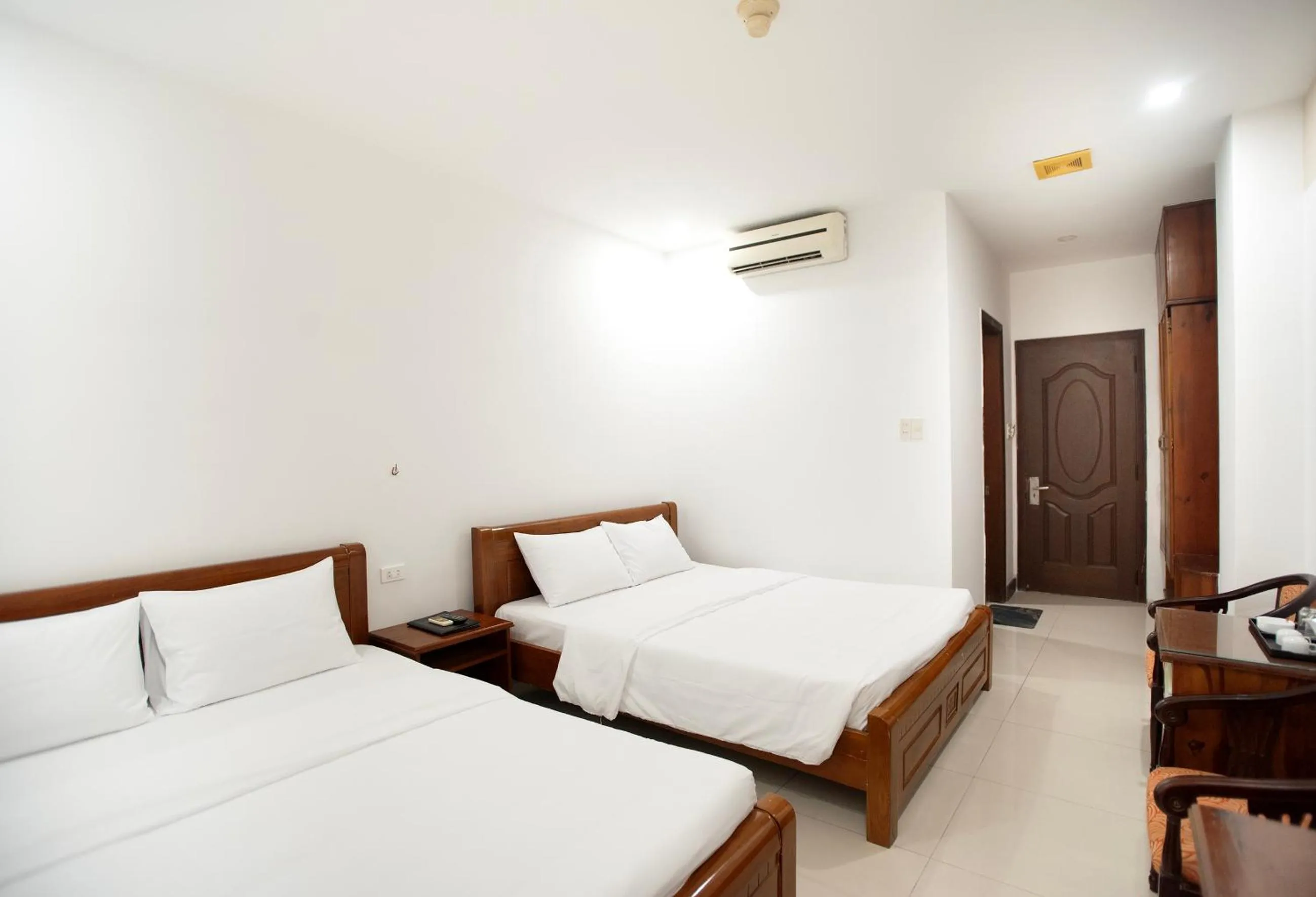 Bed in EDEN QUY NHON HOTEL