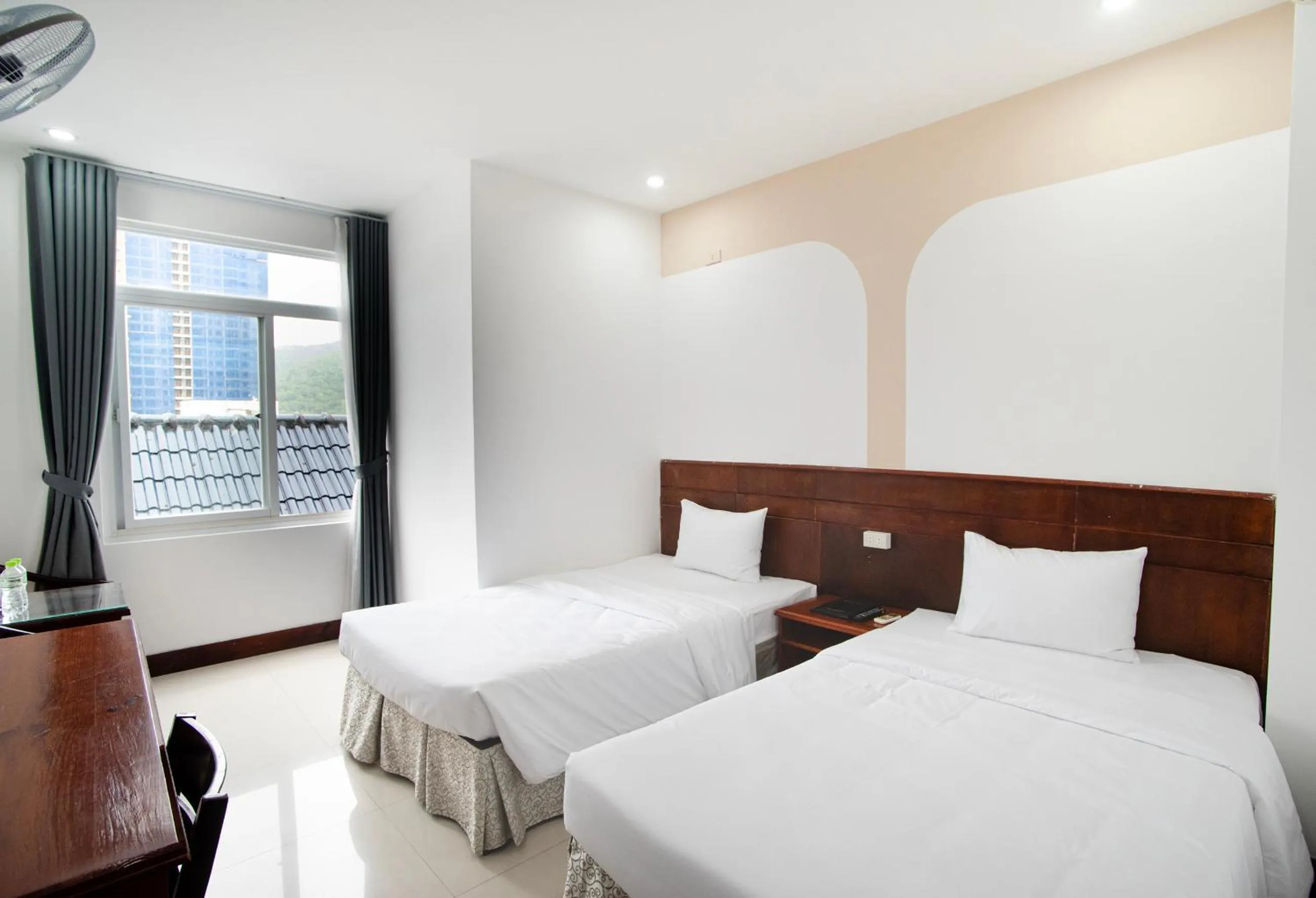 Bed in EDEN QUY NHON HOTEL