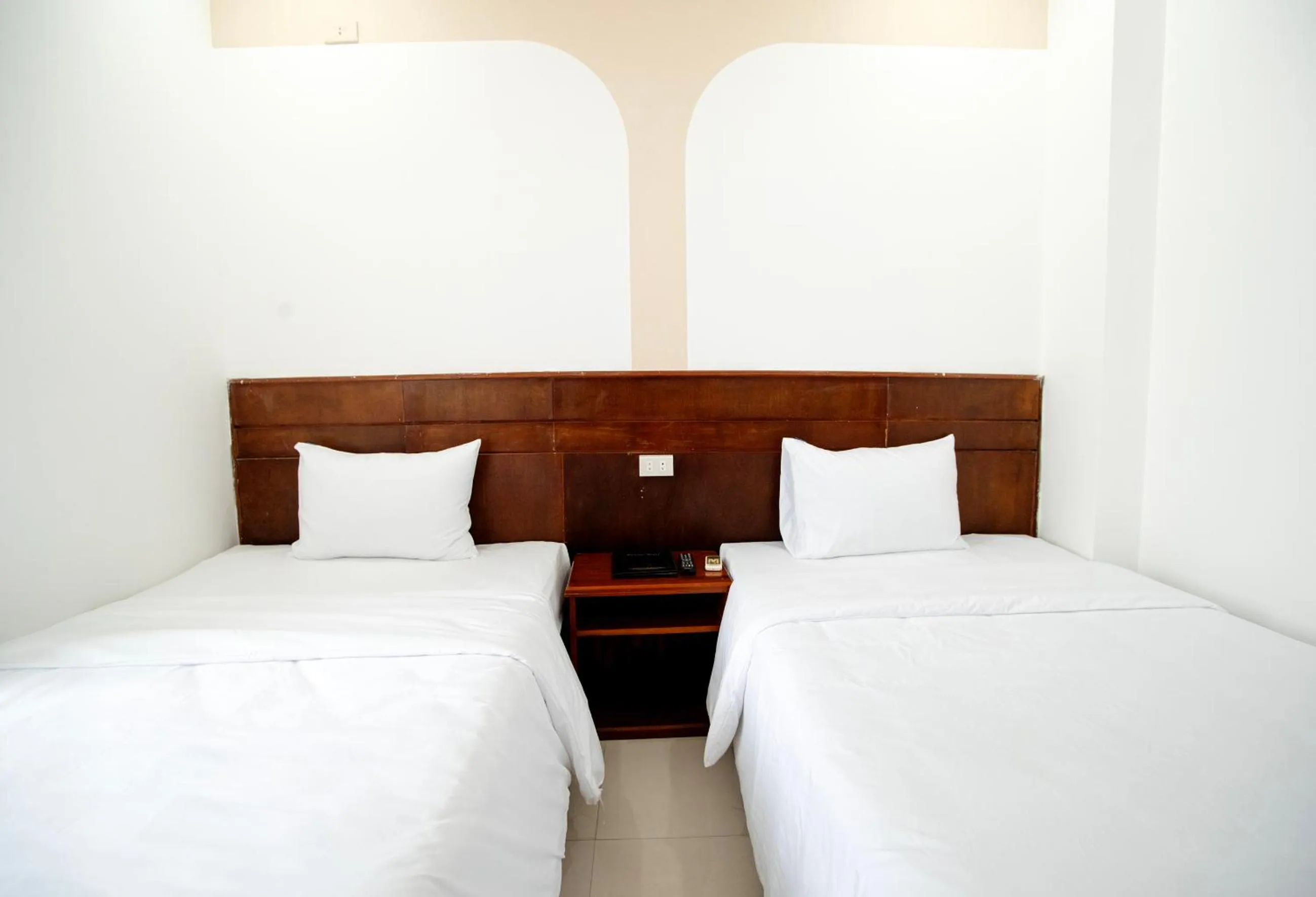 Bed in EDEN QUY NHON HOTEL