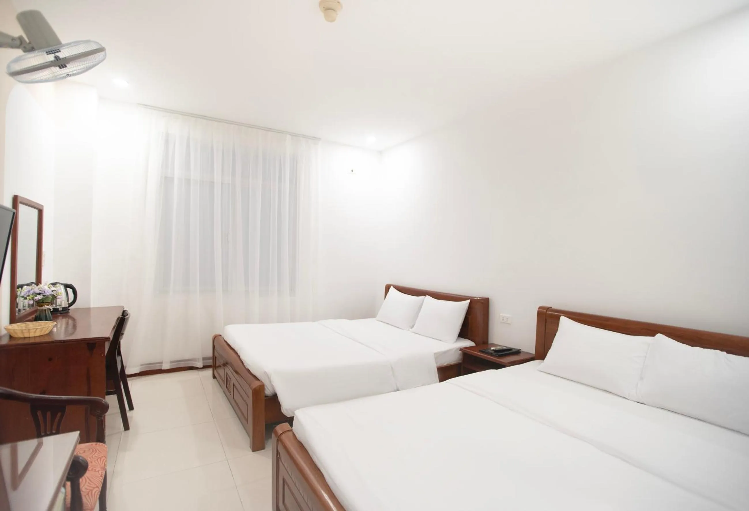 Bed in EDEN QUY NHON HOTEL