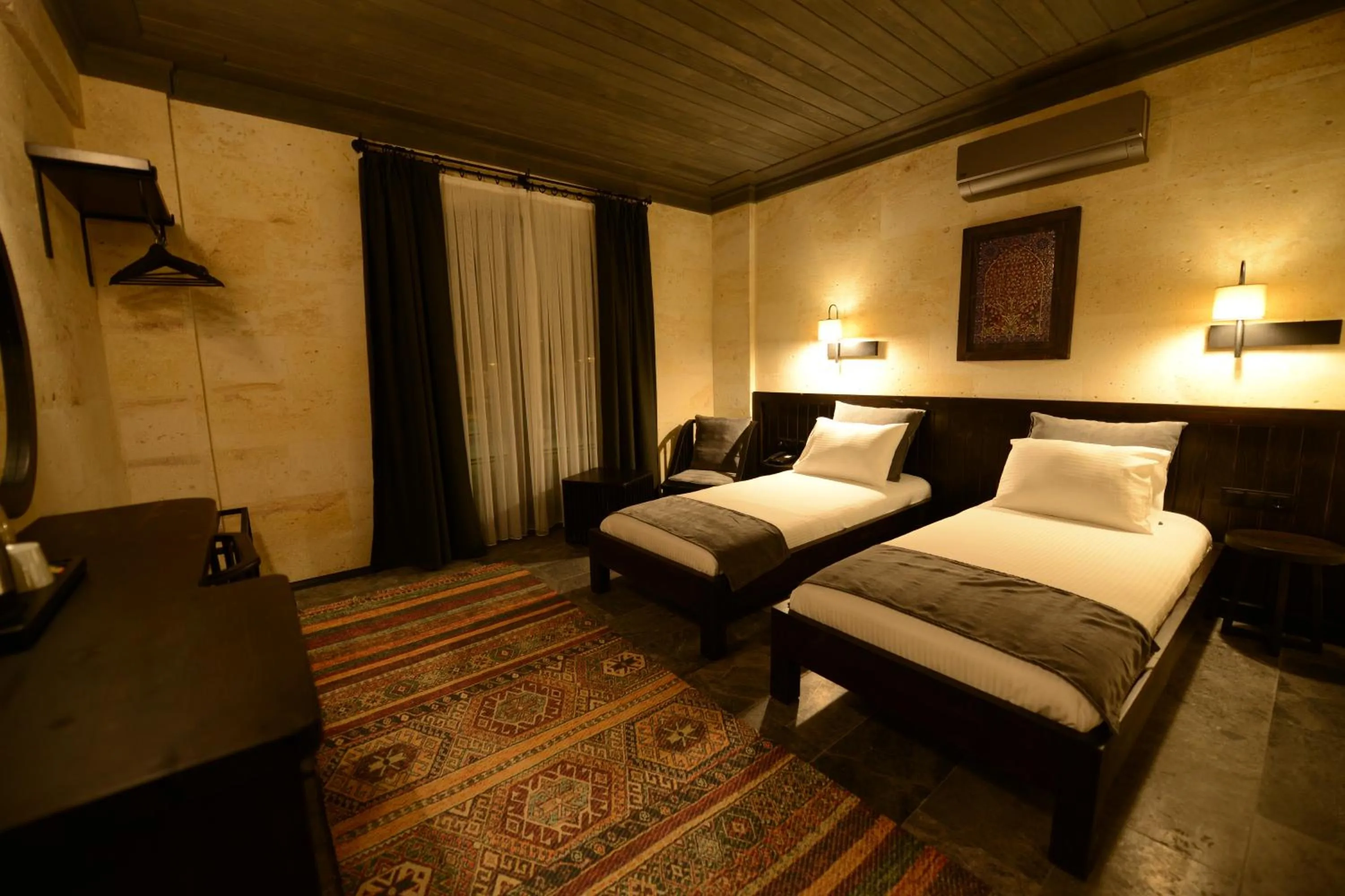 Bed in Perla Cappadocia