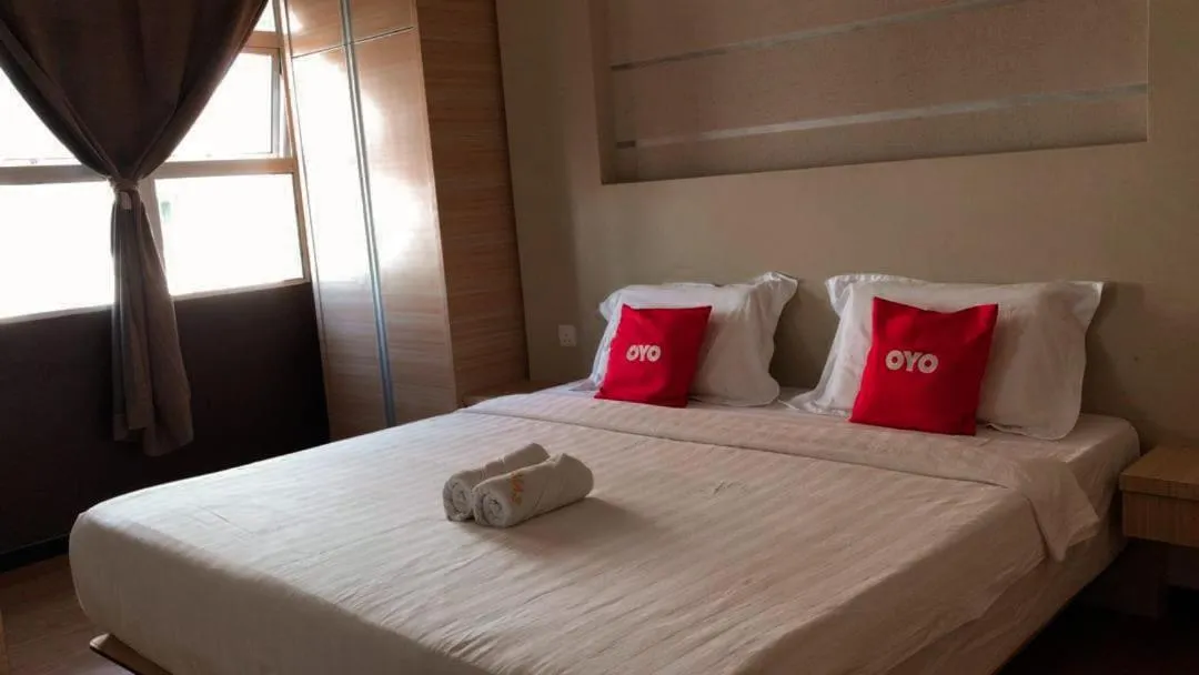 Bed in TOWERMAS HOTEL