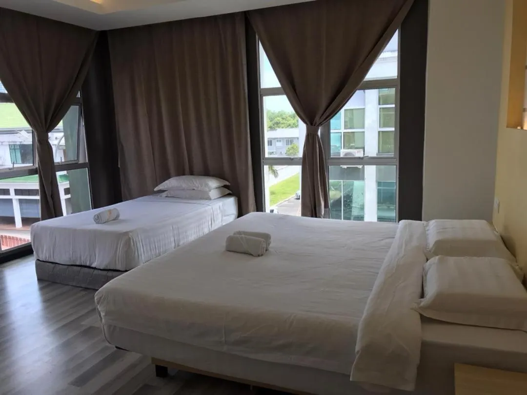 Bed in TOWERMAS HOTEL