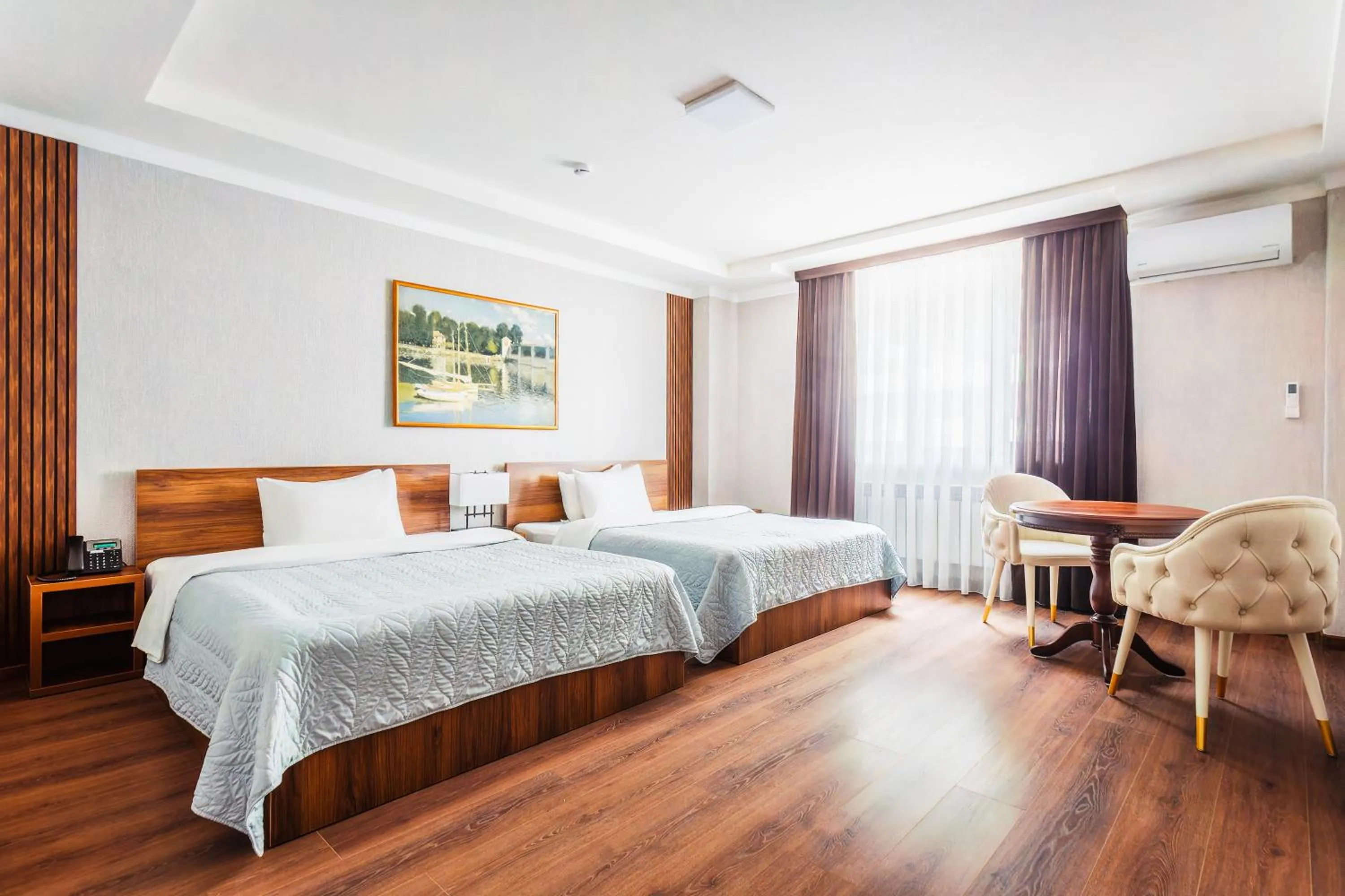 Bed in RICH PARK HOTEL