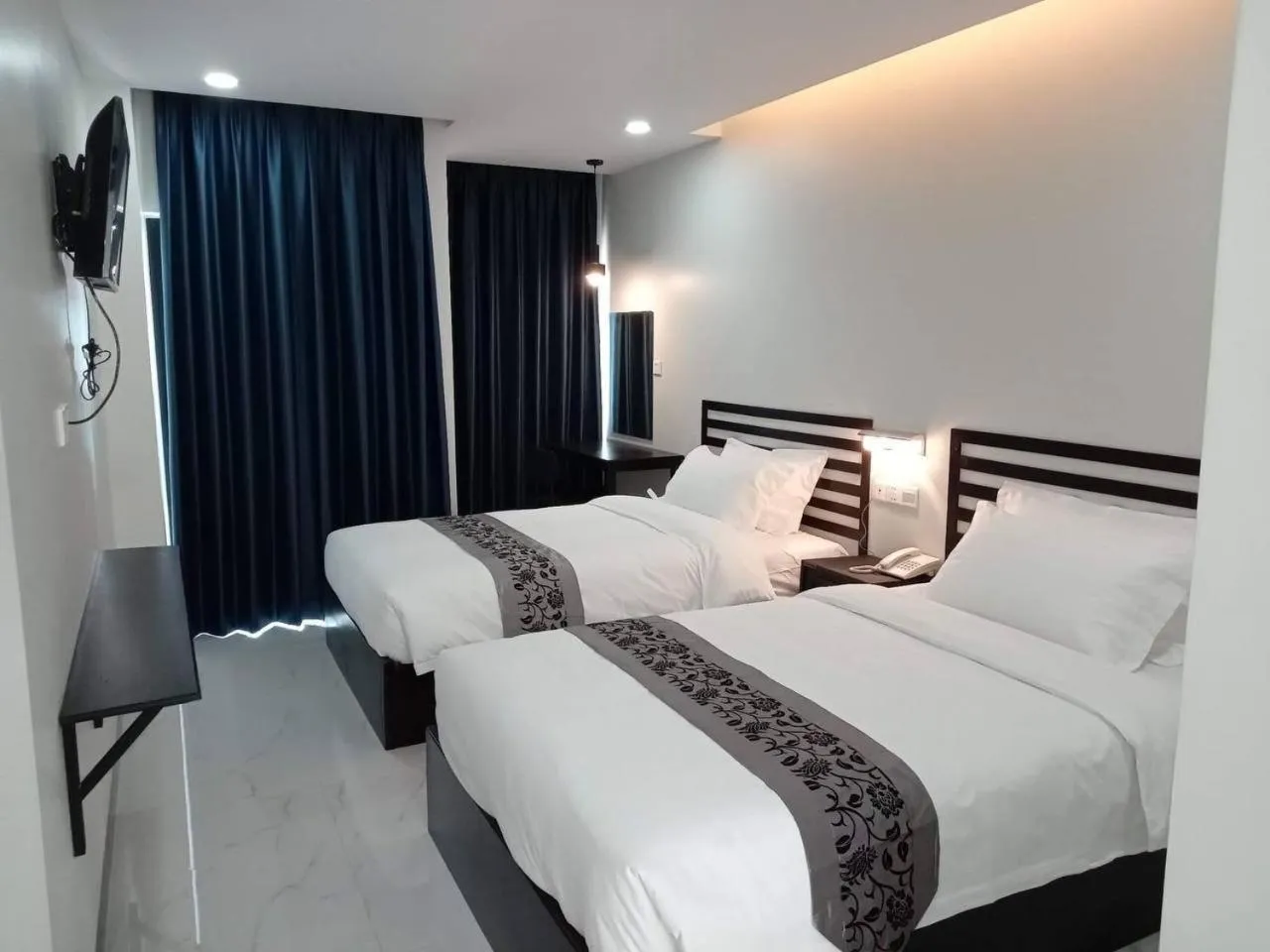 Bed in Hotel Chom Chao City