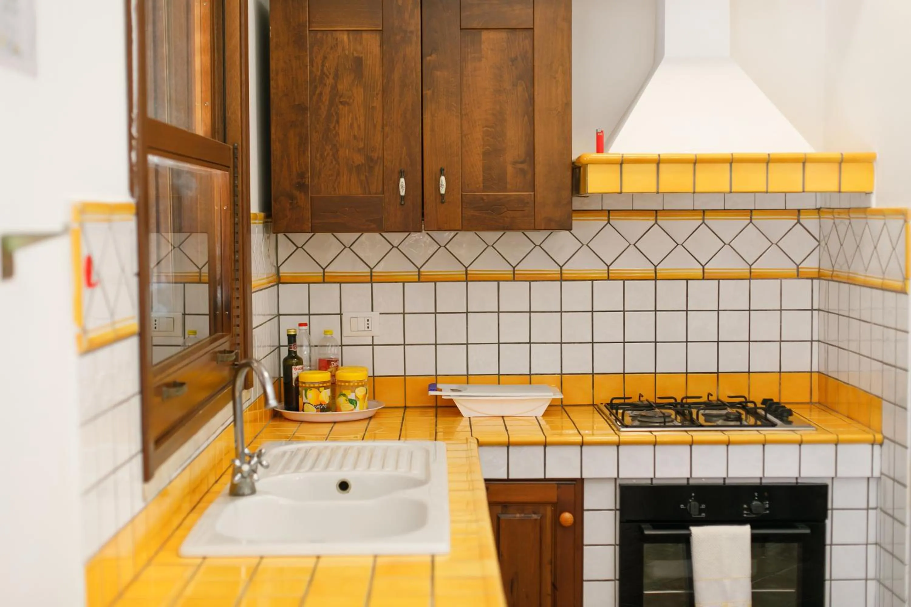 kitchen in SanVitoTour- Residence Il Baglio