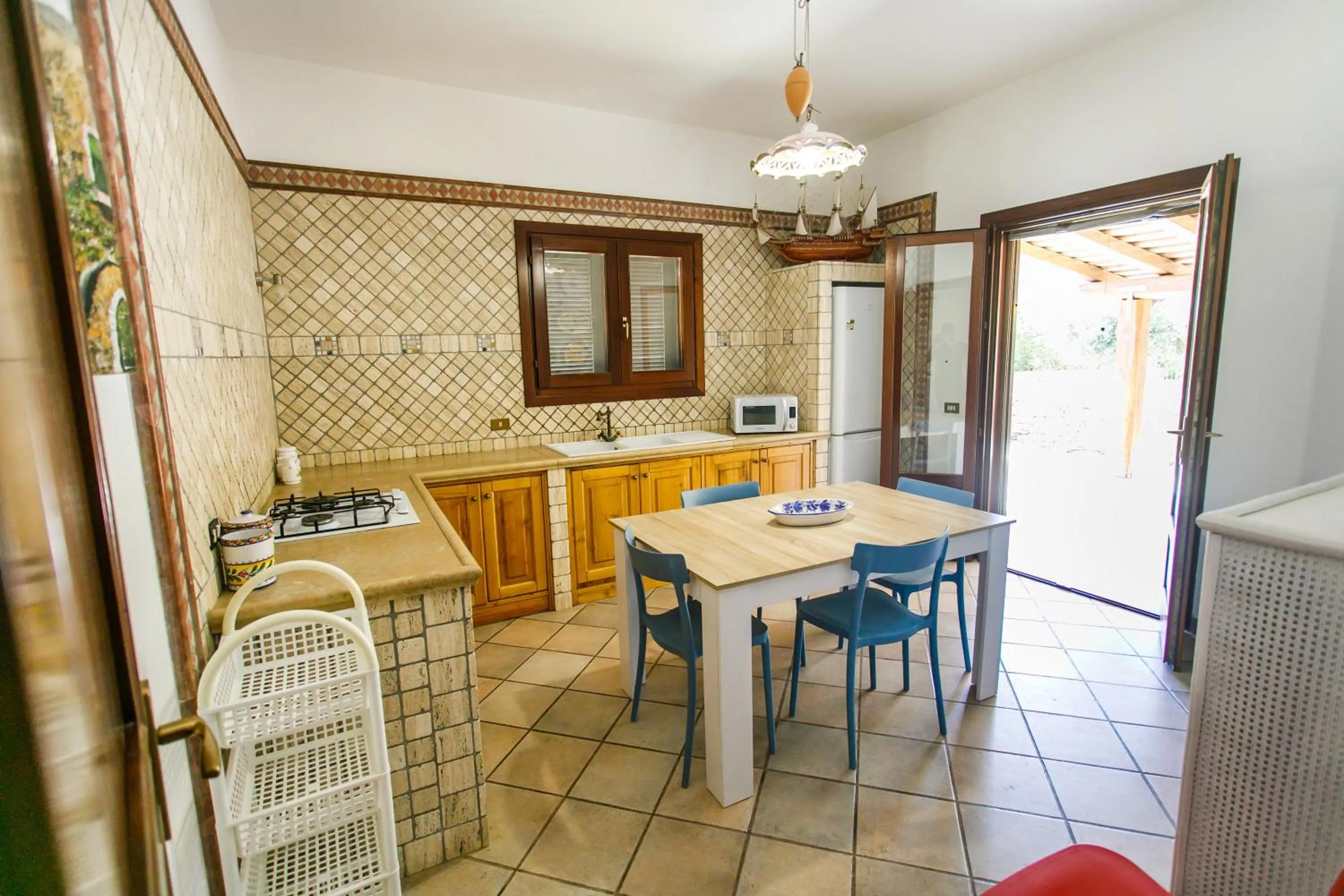 kitchen in SanVitoTour- Residence Il Baglio