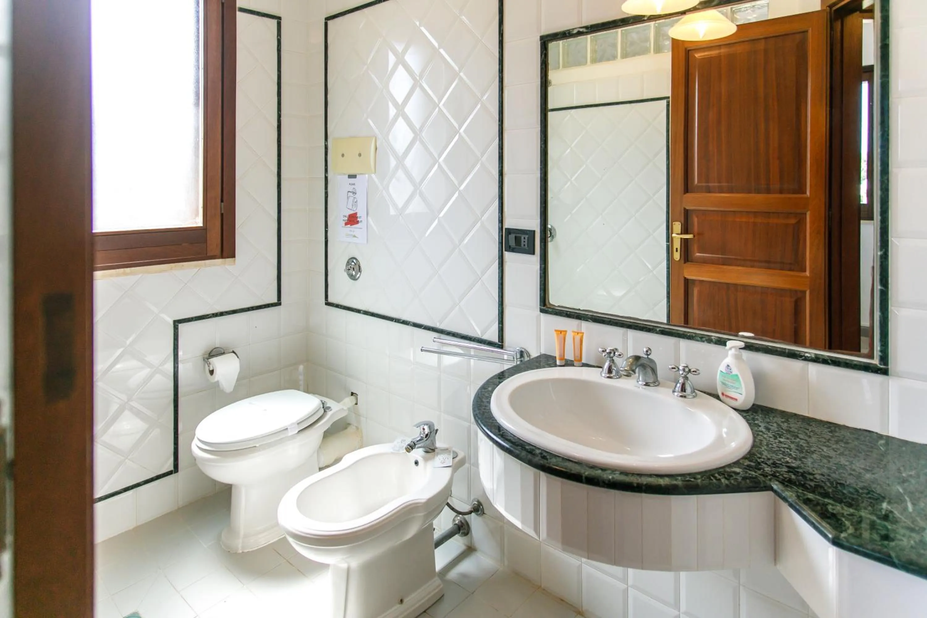 Bathroom in SanVitoTour- Residence Il Baglio