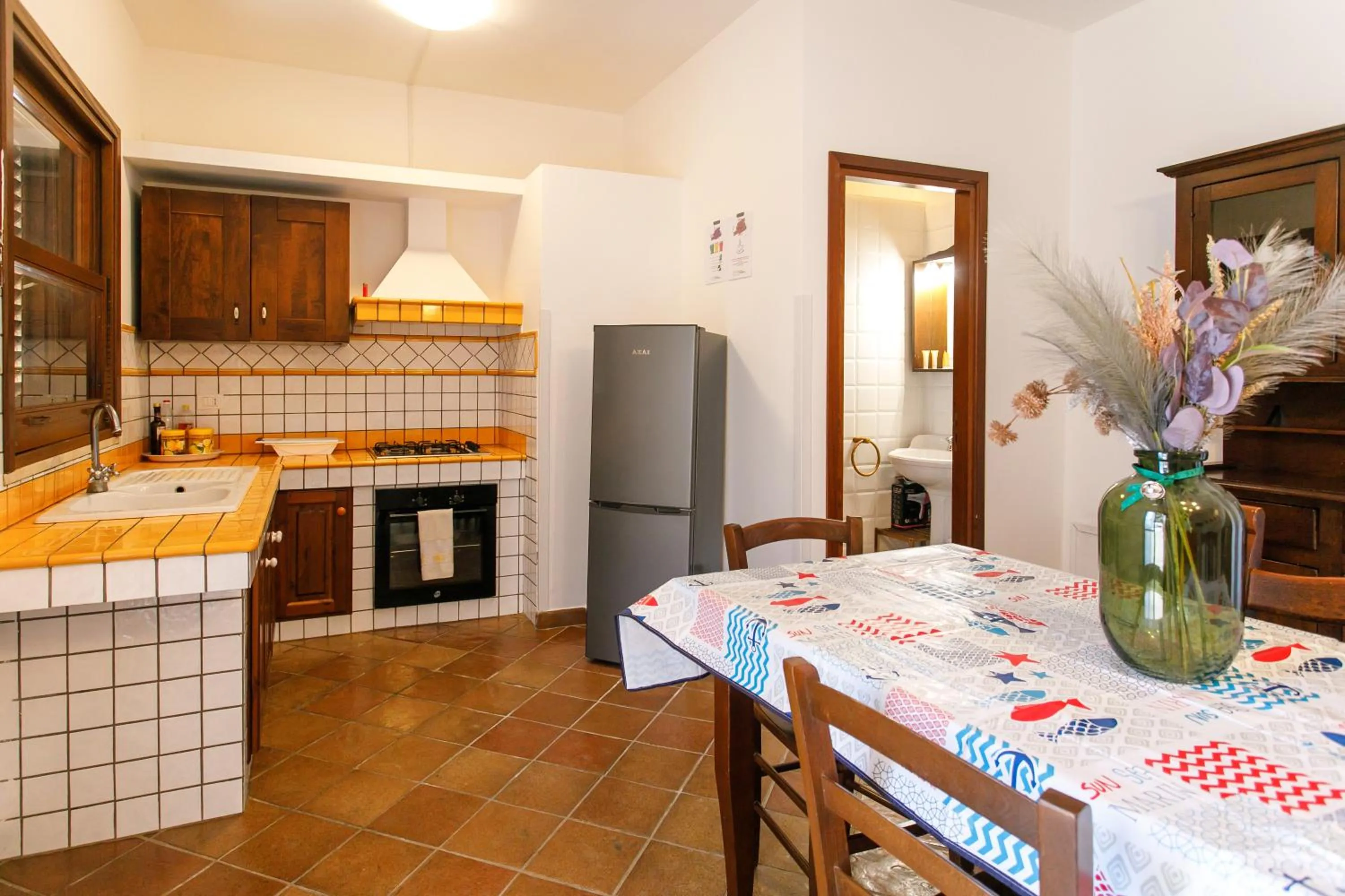 kitchen in SanVitoTour- Residence Il Baglio