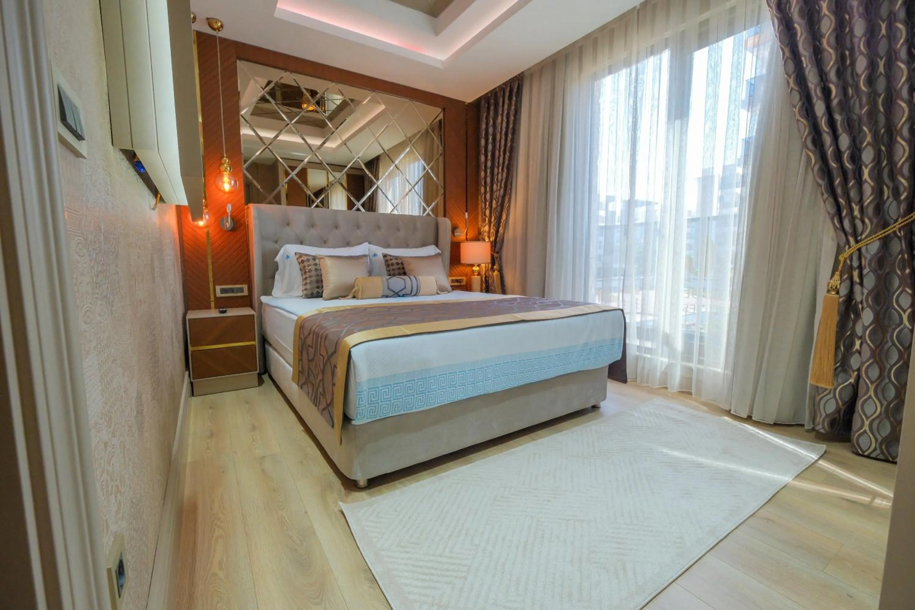 Bed in Elysium Deluxe Suites Antalya