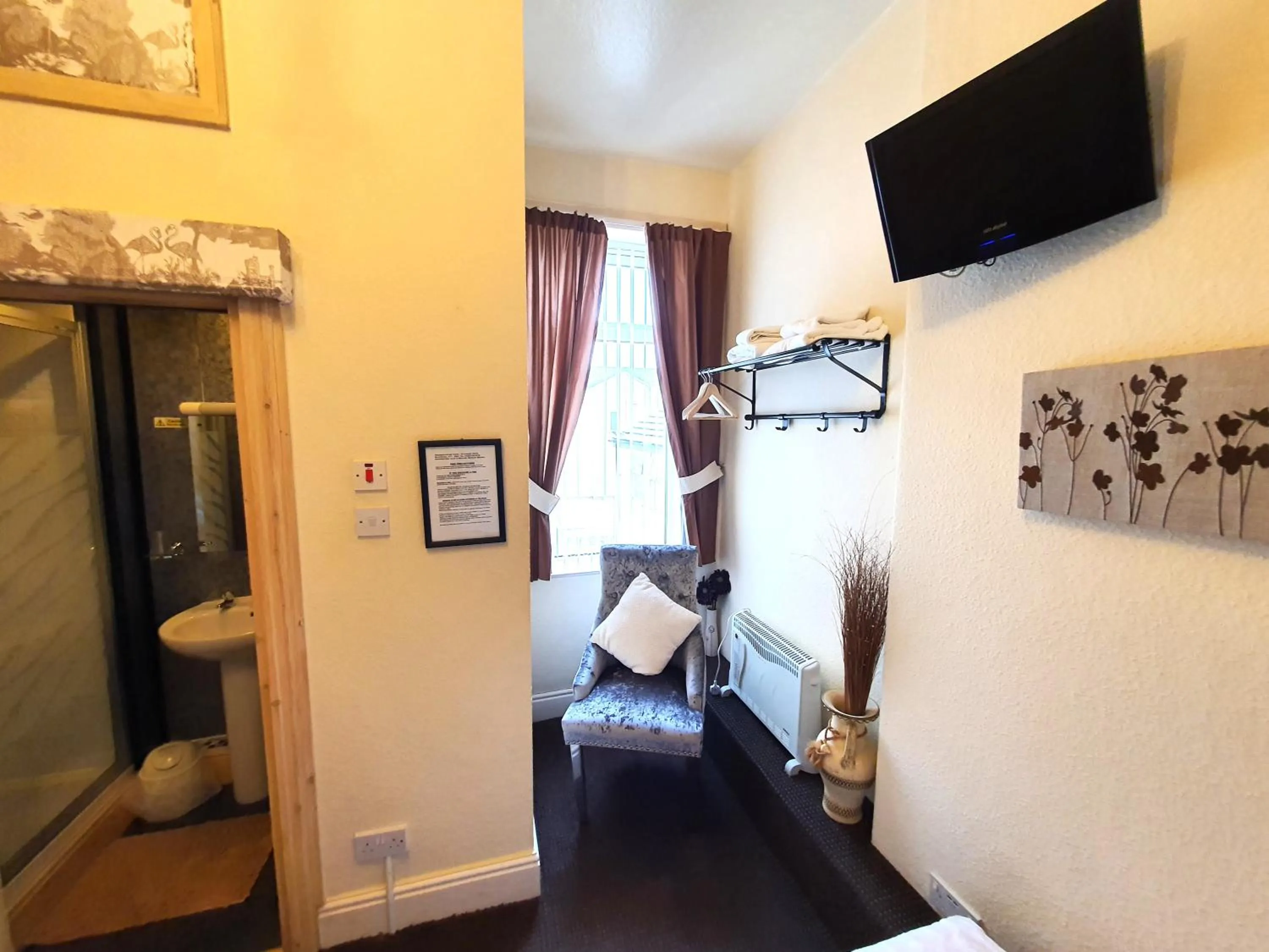 Bedroom in Windsor House Hotel