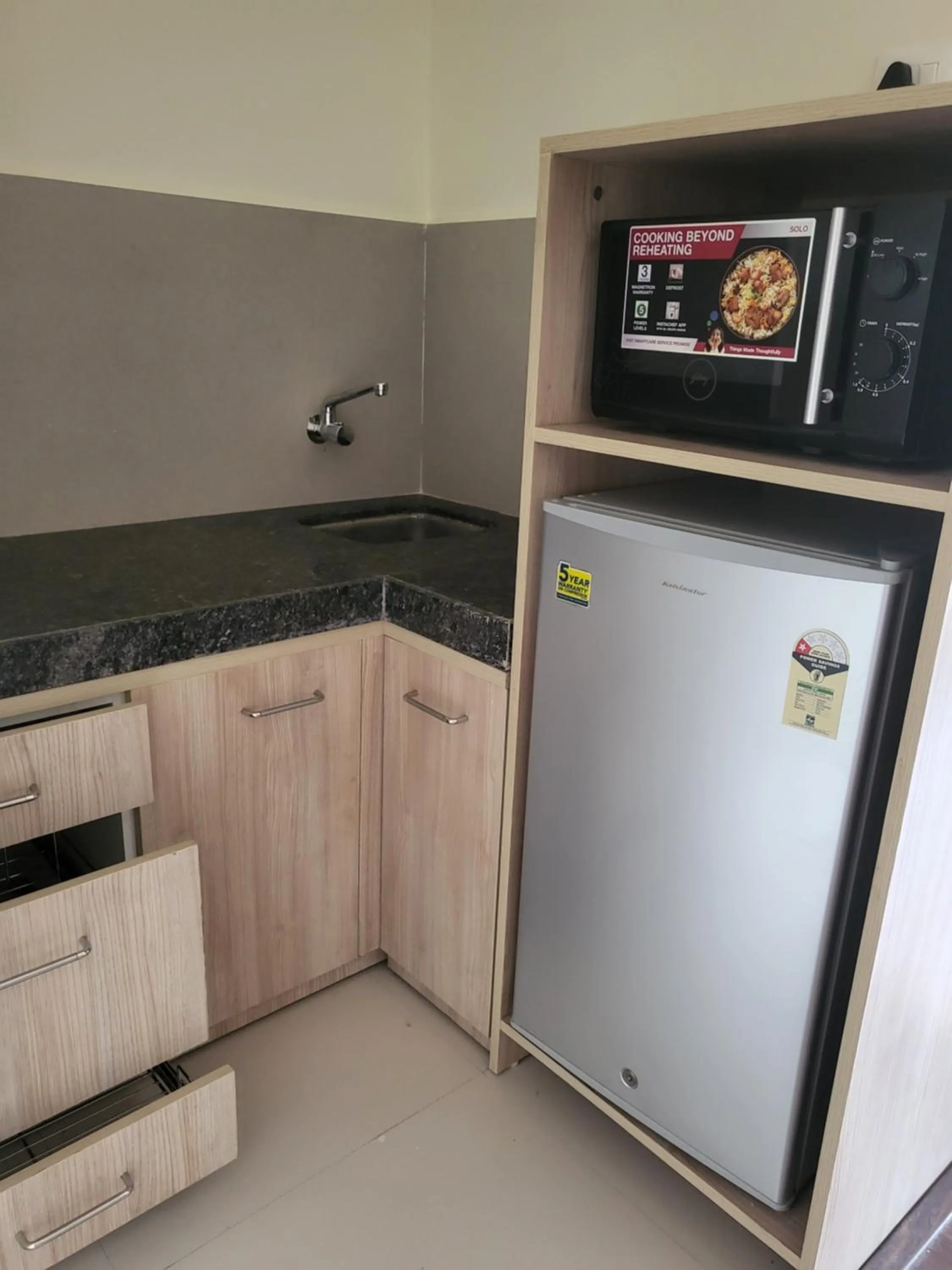 Kitchen or kitchenette in Starlit Suites Shirdi