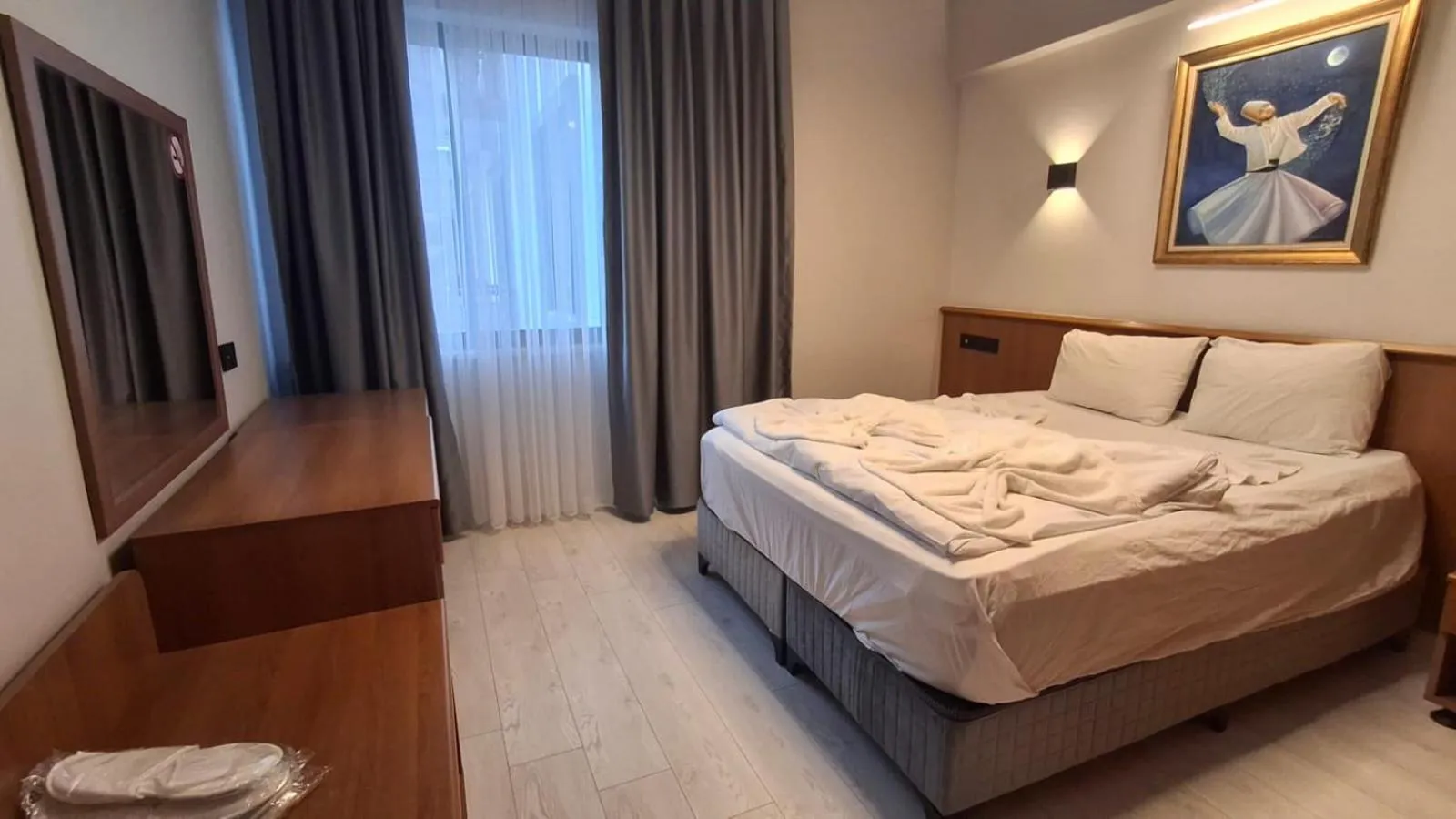 Bed in Orange Garden Aparts & Hotel THE NORDIC