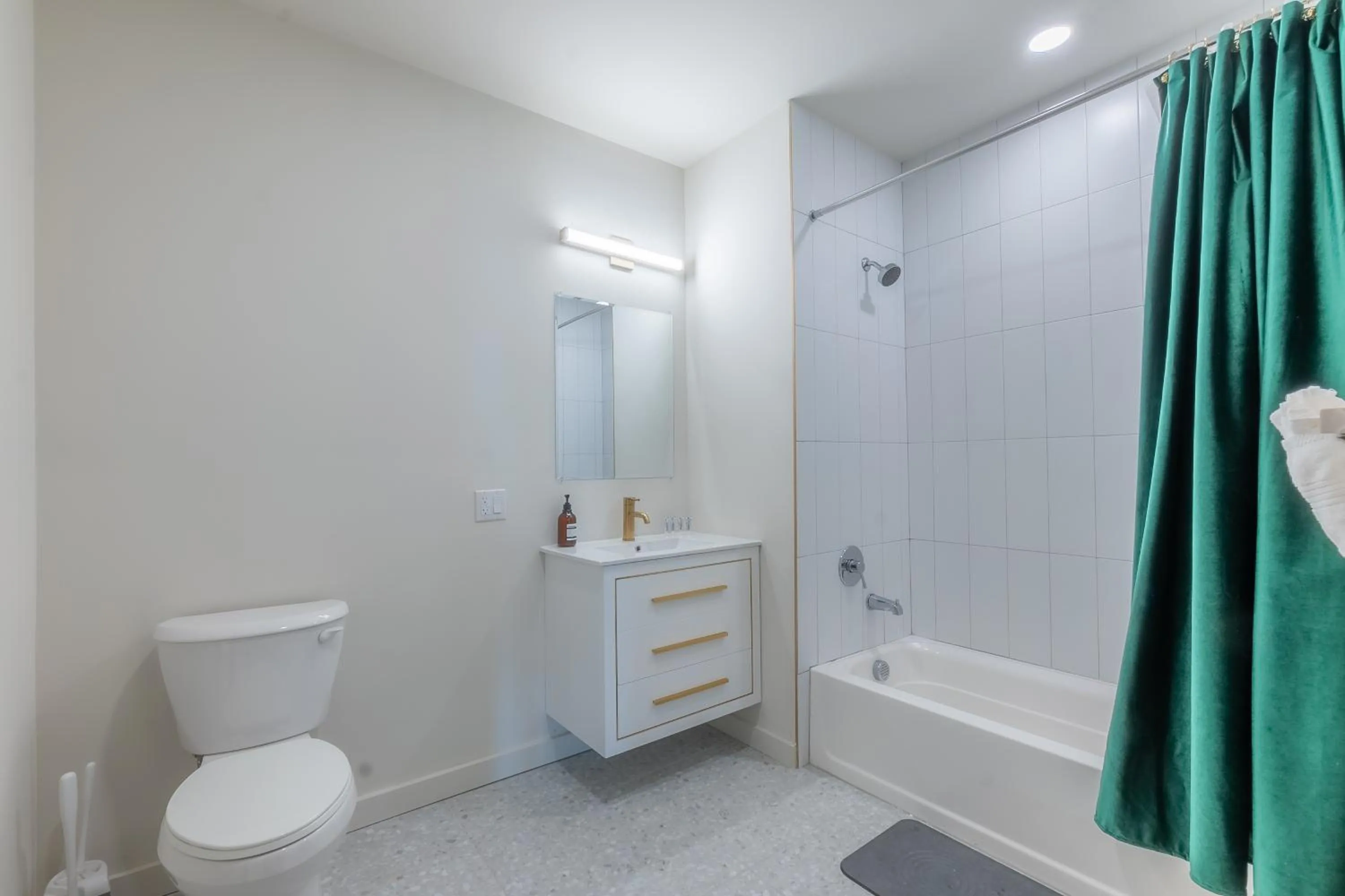 Shower in Emerald Escape, Free Parking, 2 Bath, Sleeps 8 Near American Dream and The Airport, King Bed and 2 Queen Beds, Washer and Dryer