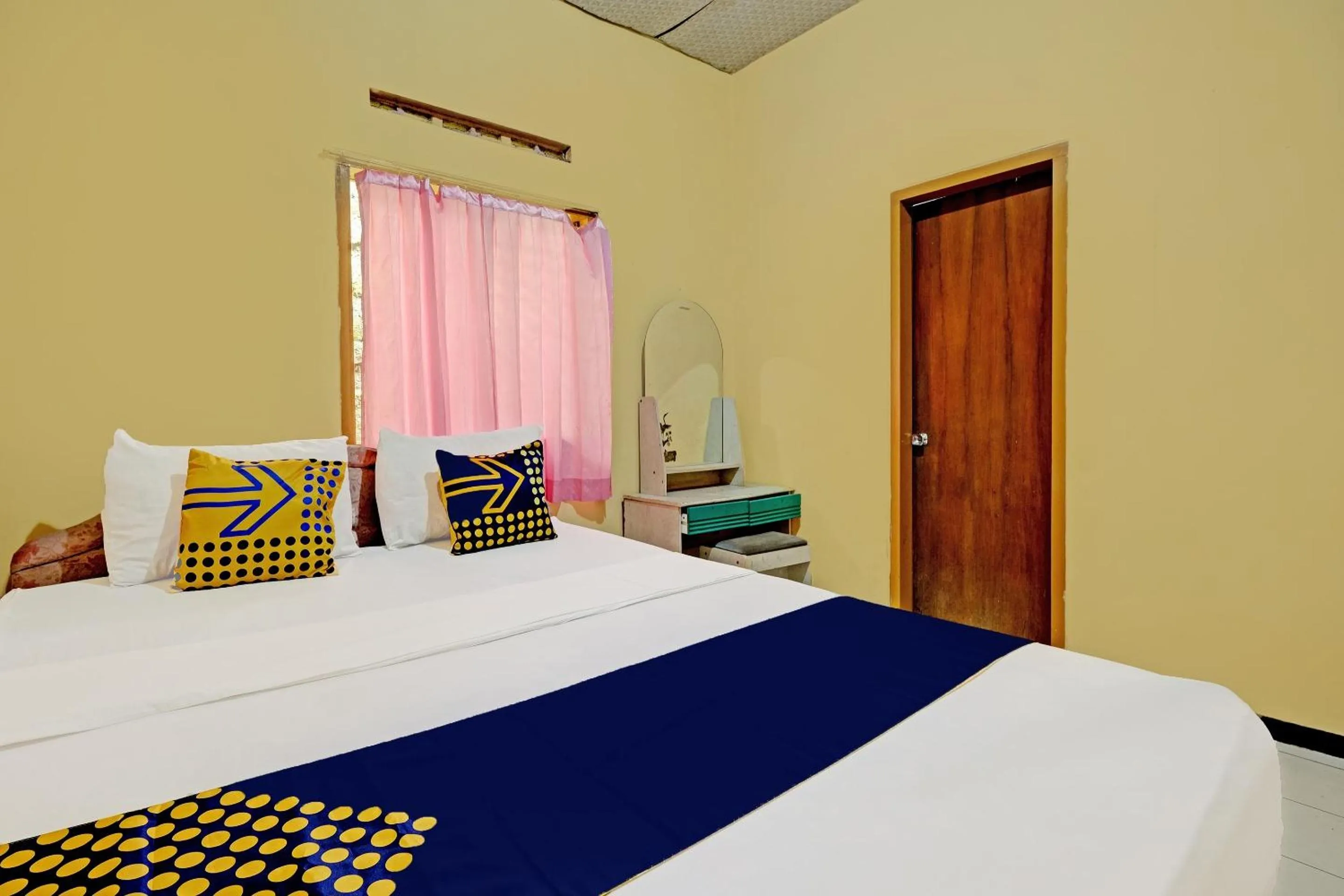 Bedroom in SPOT ON 92408 Hotel Renata 2