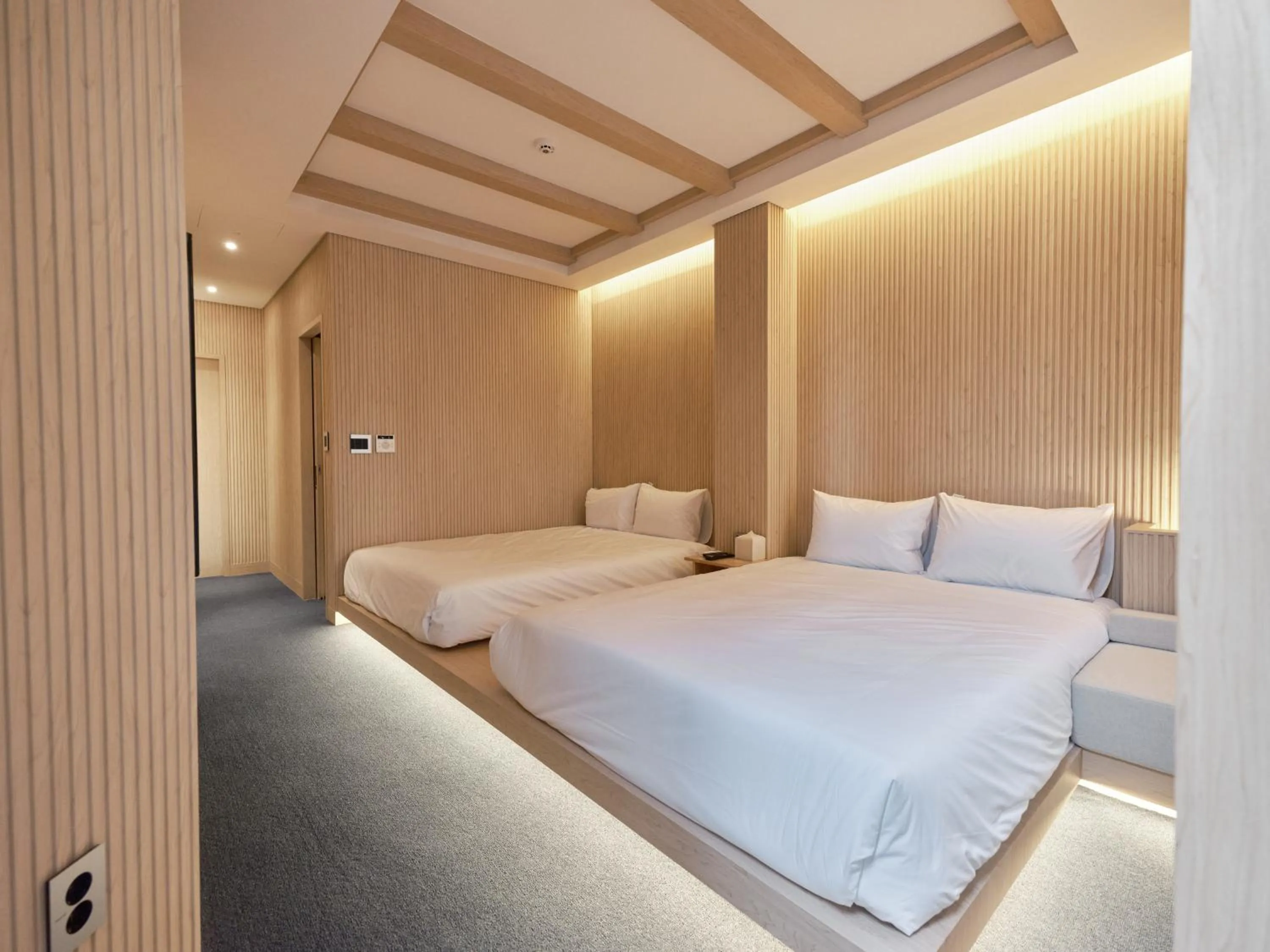 Bedroom, Bed in UH Suite Seoul Square