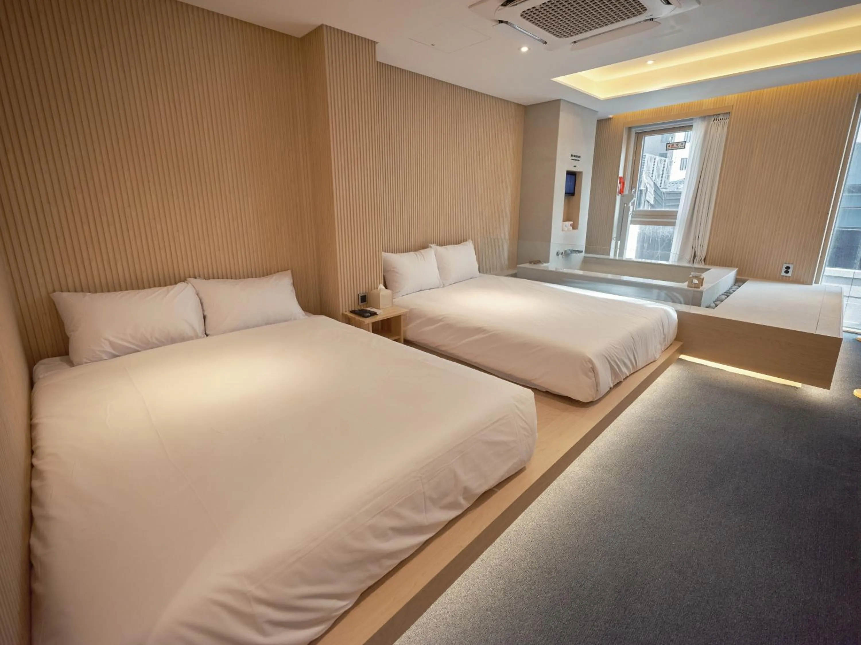 Bedroom, Bed in UH Suite Seoul Square