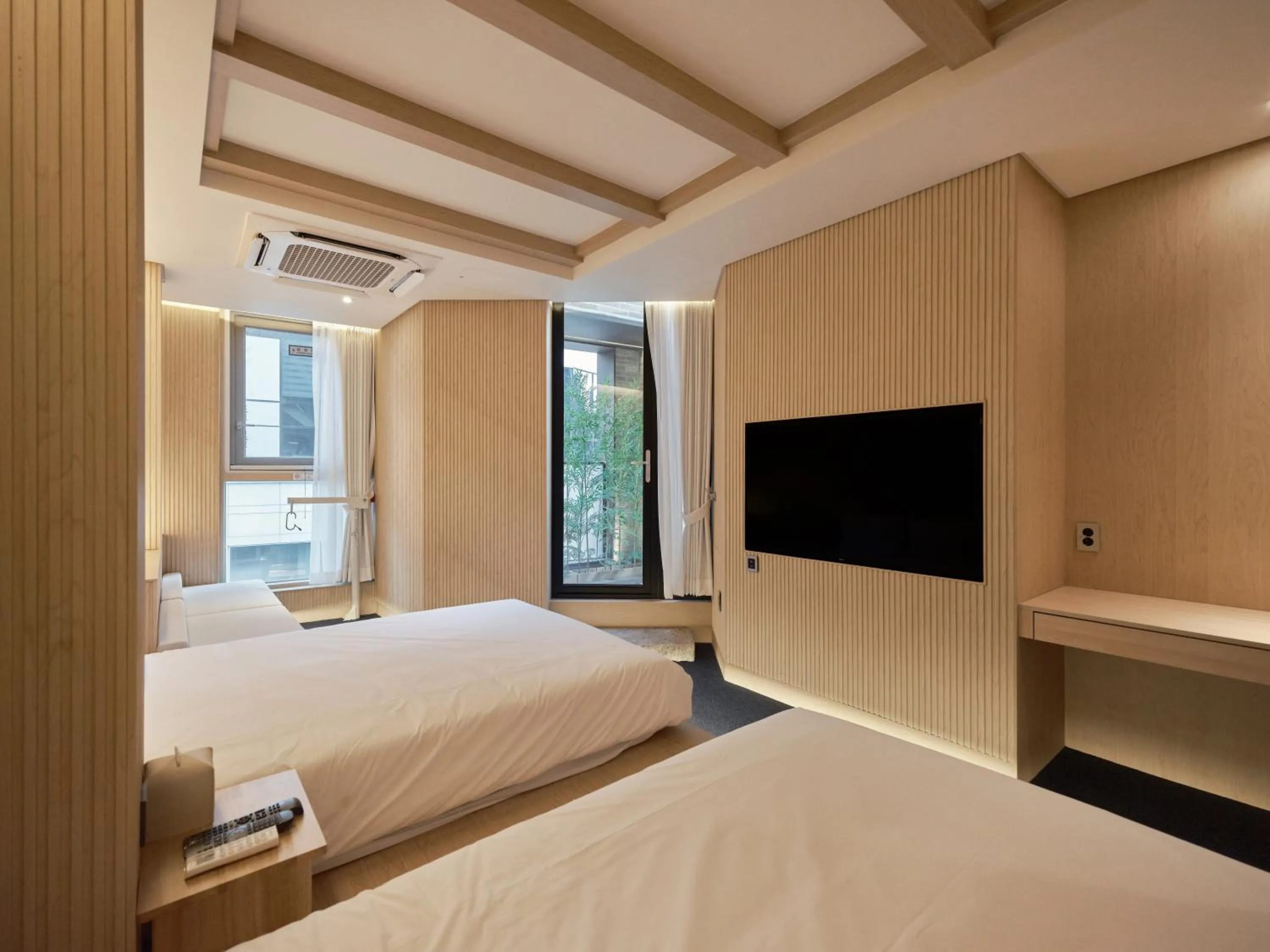 Bedroom, Bed in UH Suite Seoul Square