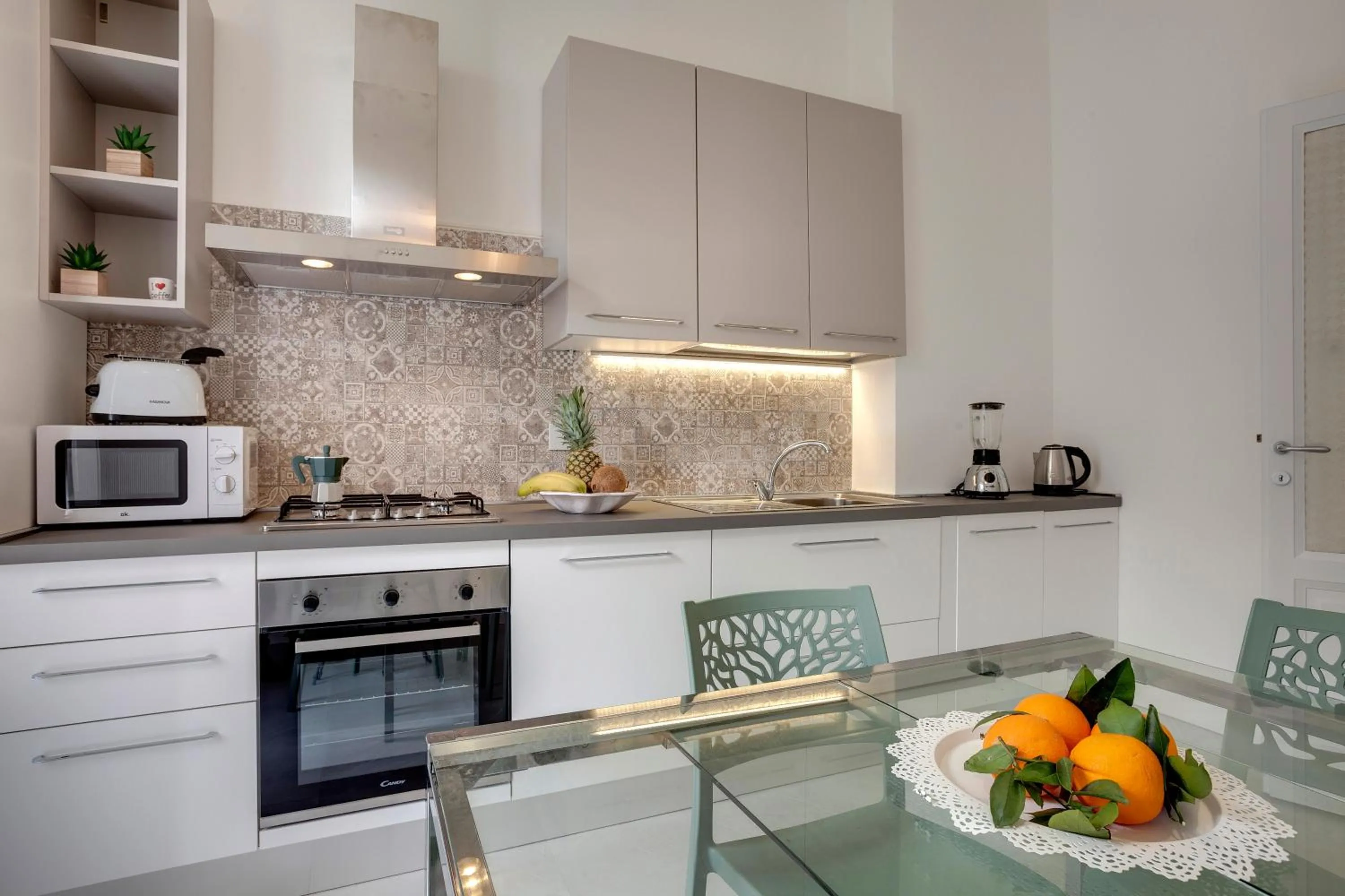 Kitchen or kitchenette in Magenta Apartment by Mamo Florence