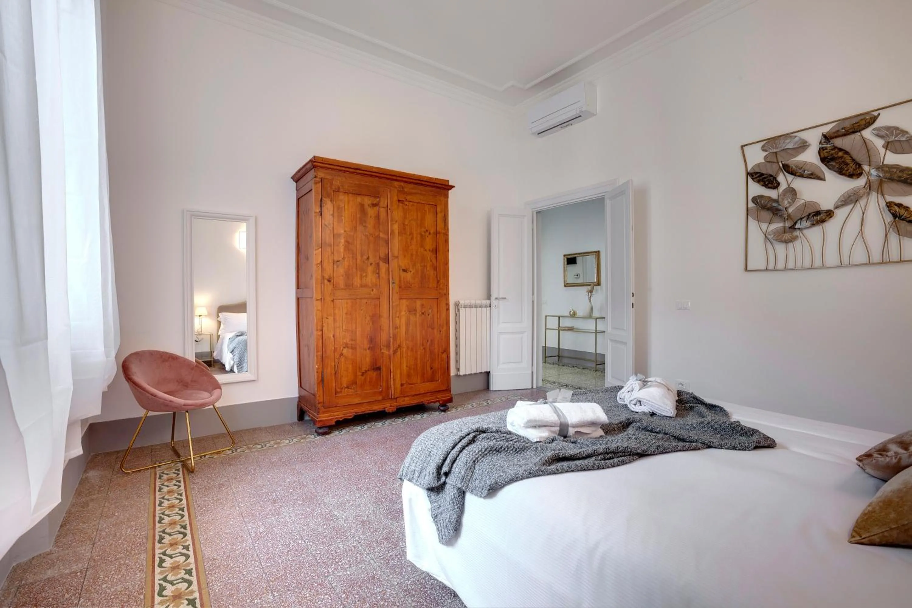 Photo of the whole room, Bed in Magenta Apartment by Mamo Florence
