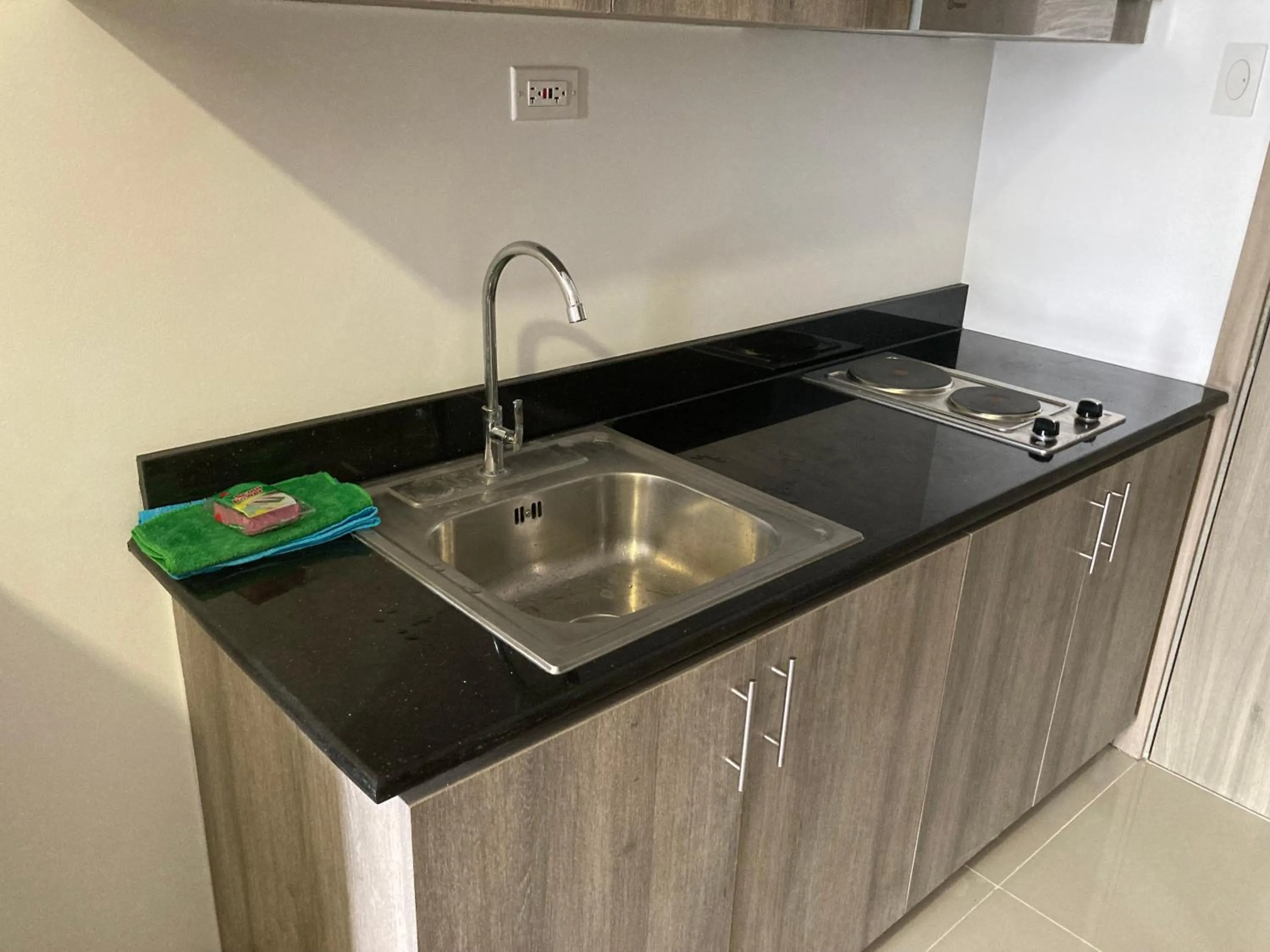 Kitchen or kitchenette in Penthouse studio at Fame Residence 41st Floor, ShangriLa-Megamall