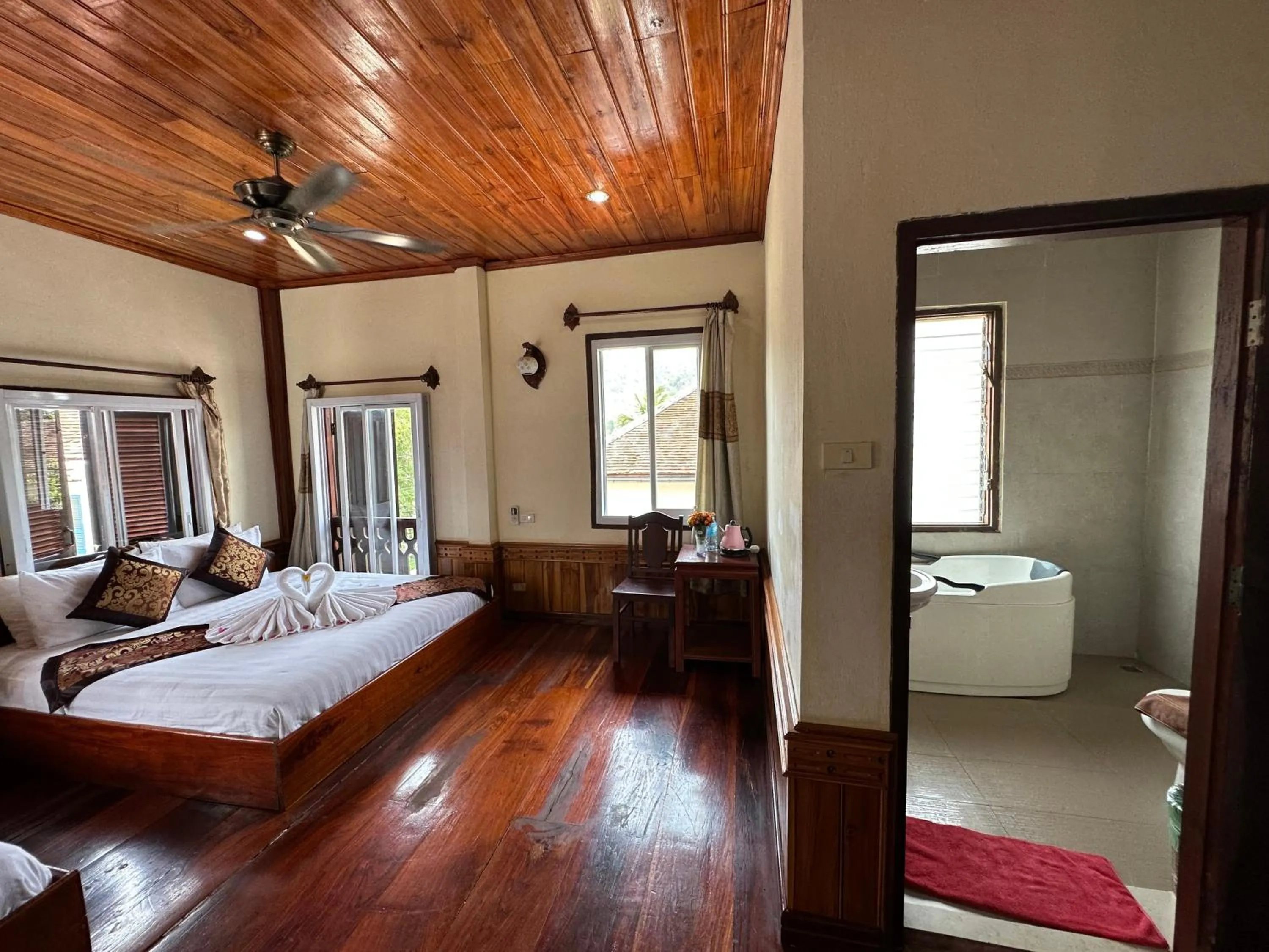 Bathroom, Bed in Villa Thida Mekong Riverside