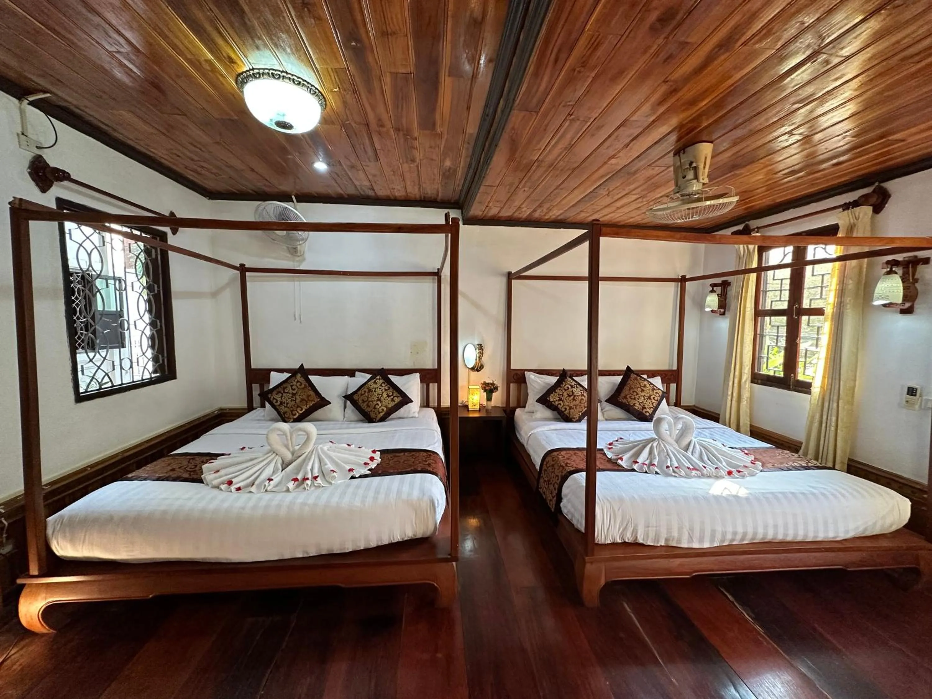 Bed in Villa Thida Mekong Riverside