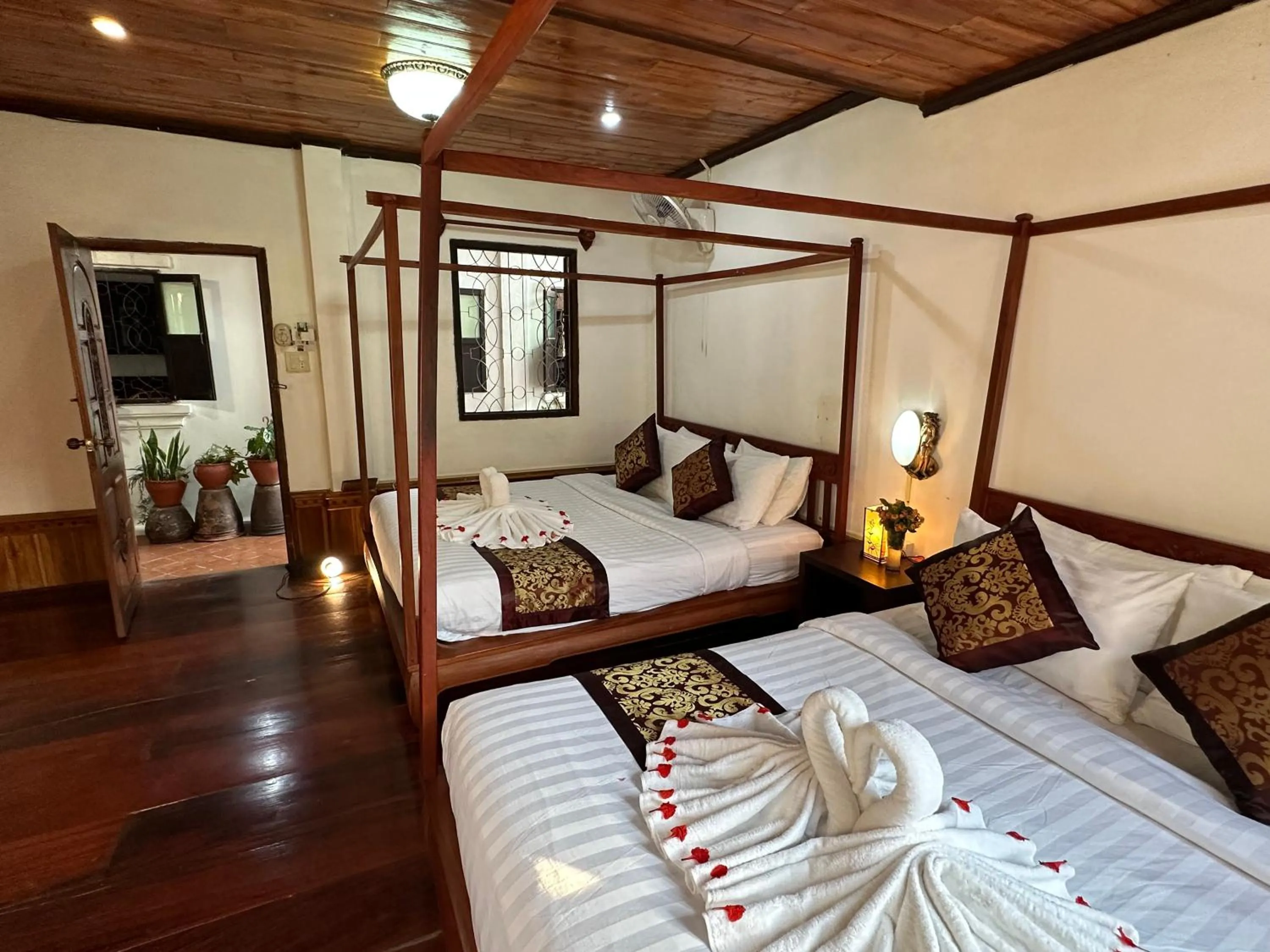 Bed in Villa Thida Mekong Riverside