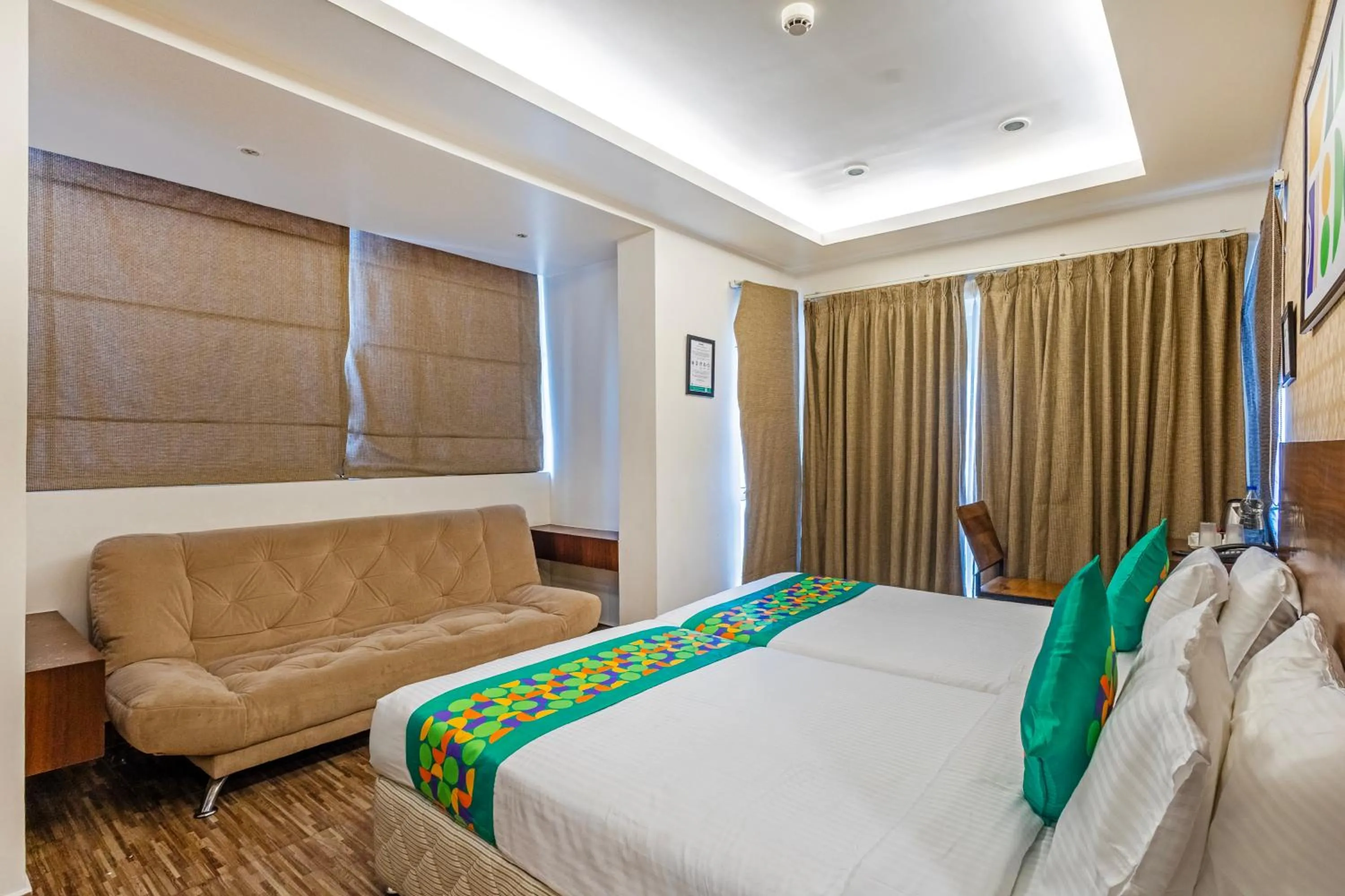 Bedroom, Bed in Treebo Premium Twin Star